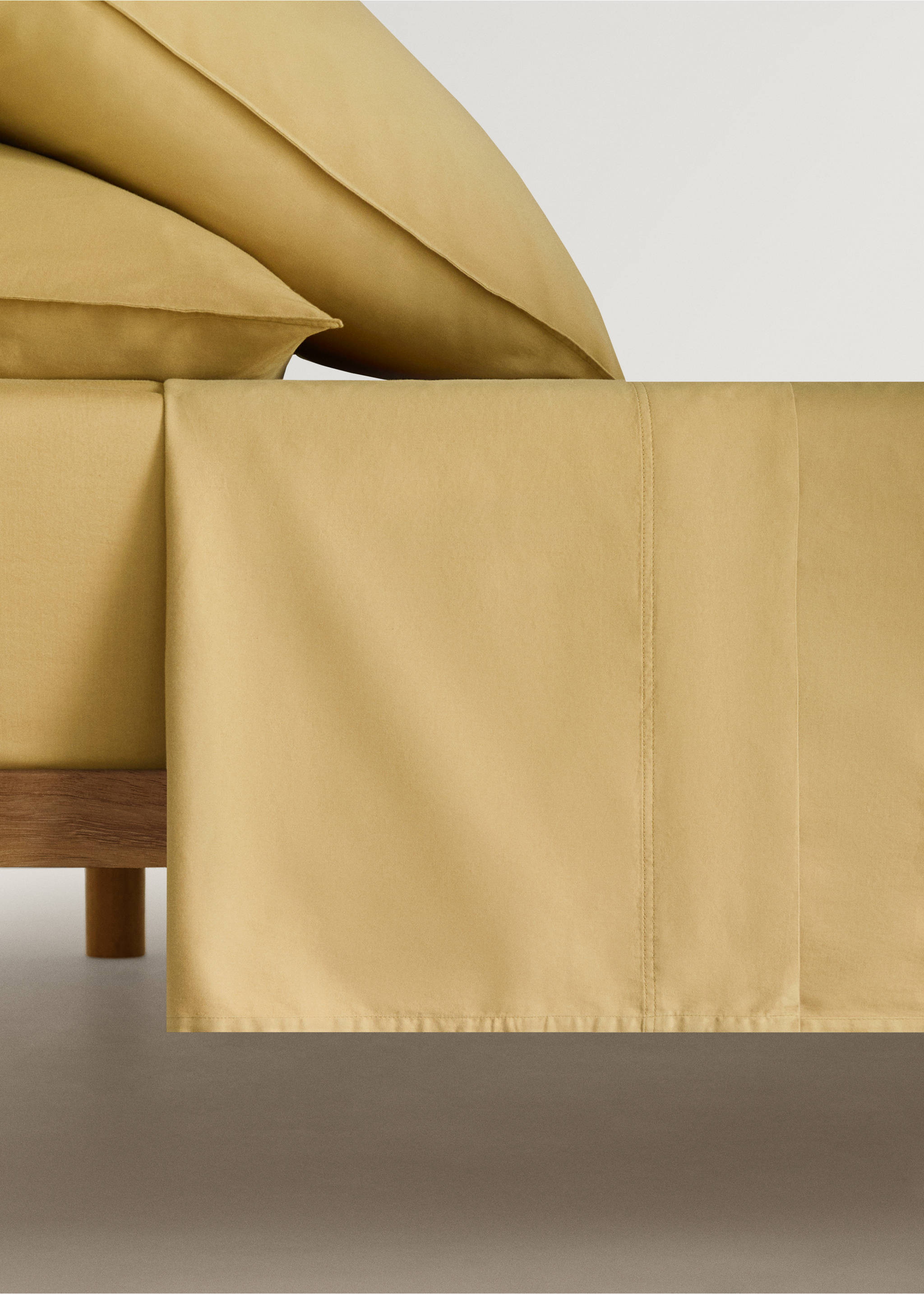 Washed cotton satin double-stitched top sheet for 90 cm bed - Article without model, Ochre. Ref: 87023026-00.