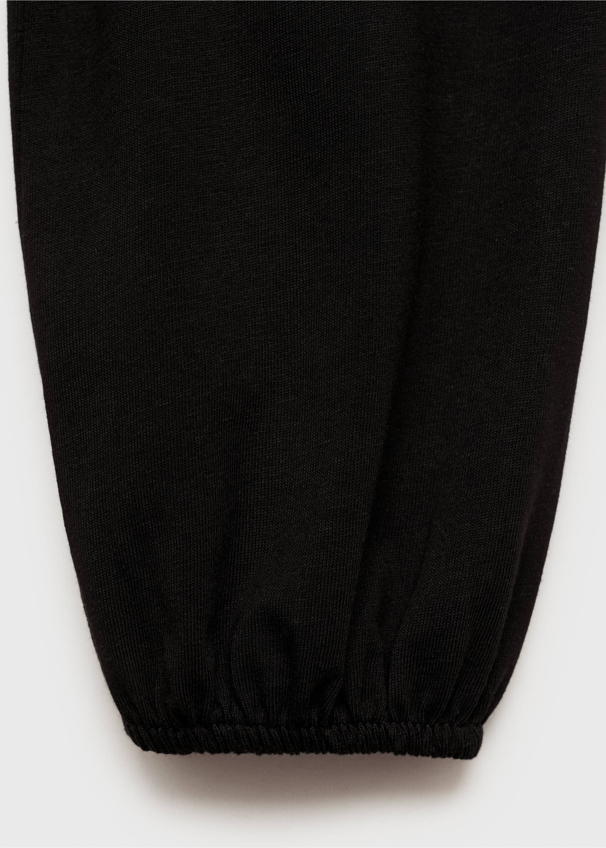 Samarreta asimètrica volant - Detall de l'article 0, Negre. Ref: 87023277-00.