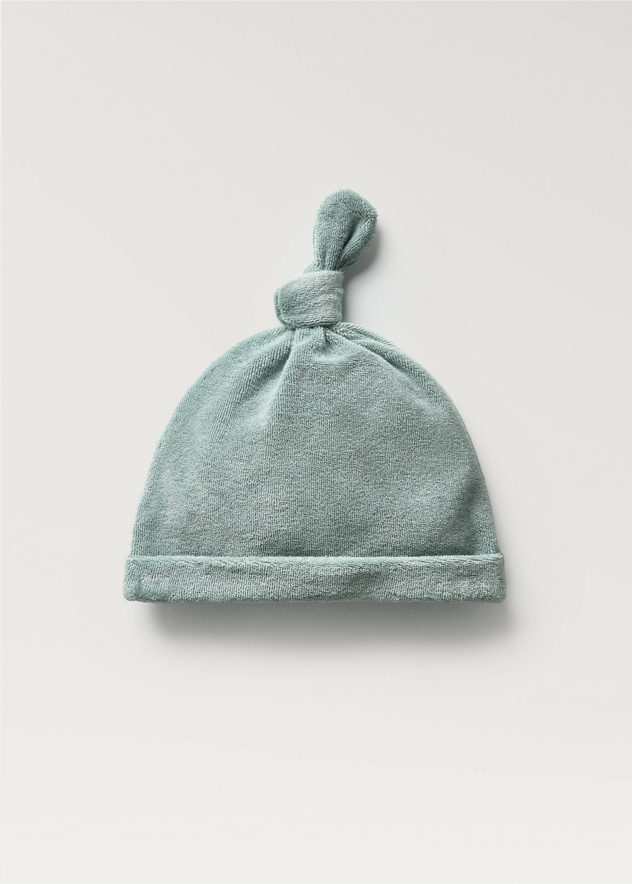 Light green baby hat with a folded brim and a knotted top., Mint Green. Ref: 87023657-00.