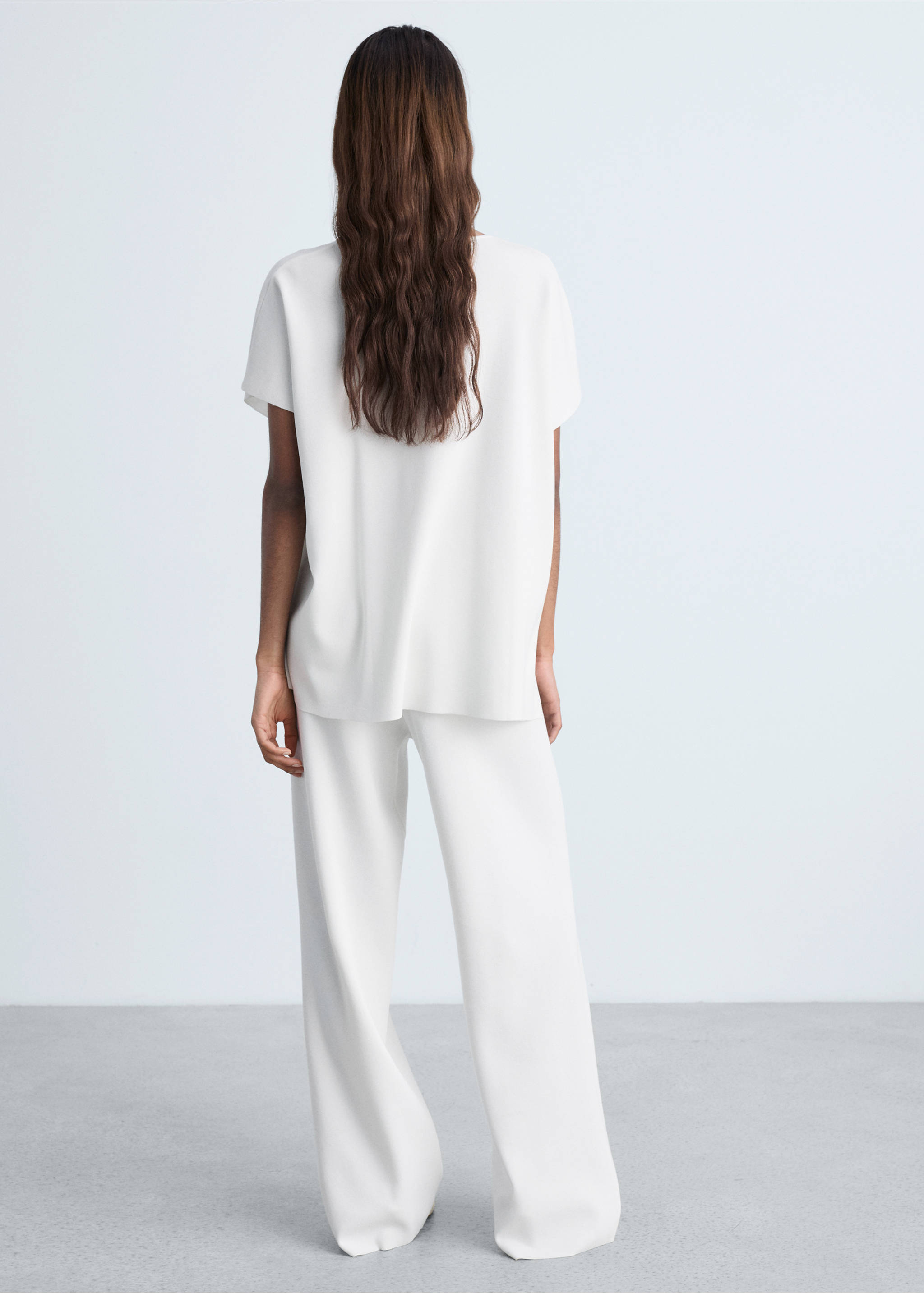Straight knitted trousers - Reverse of the article, White. Ref: 87024064-00.