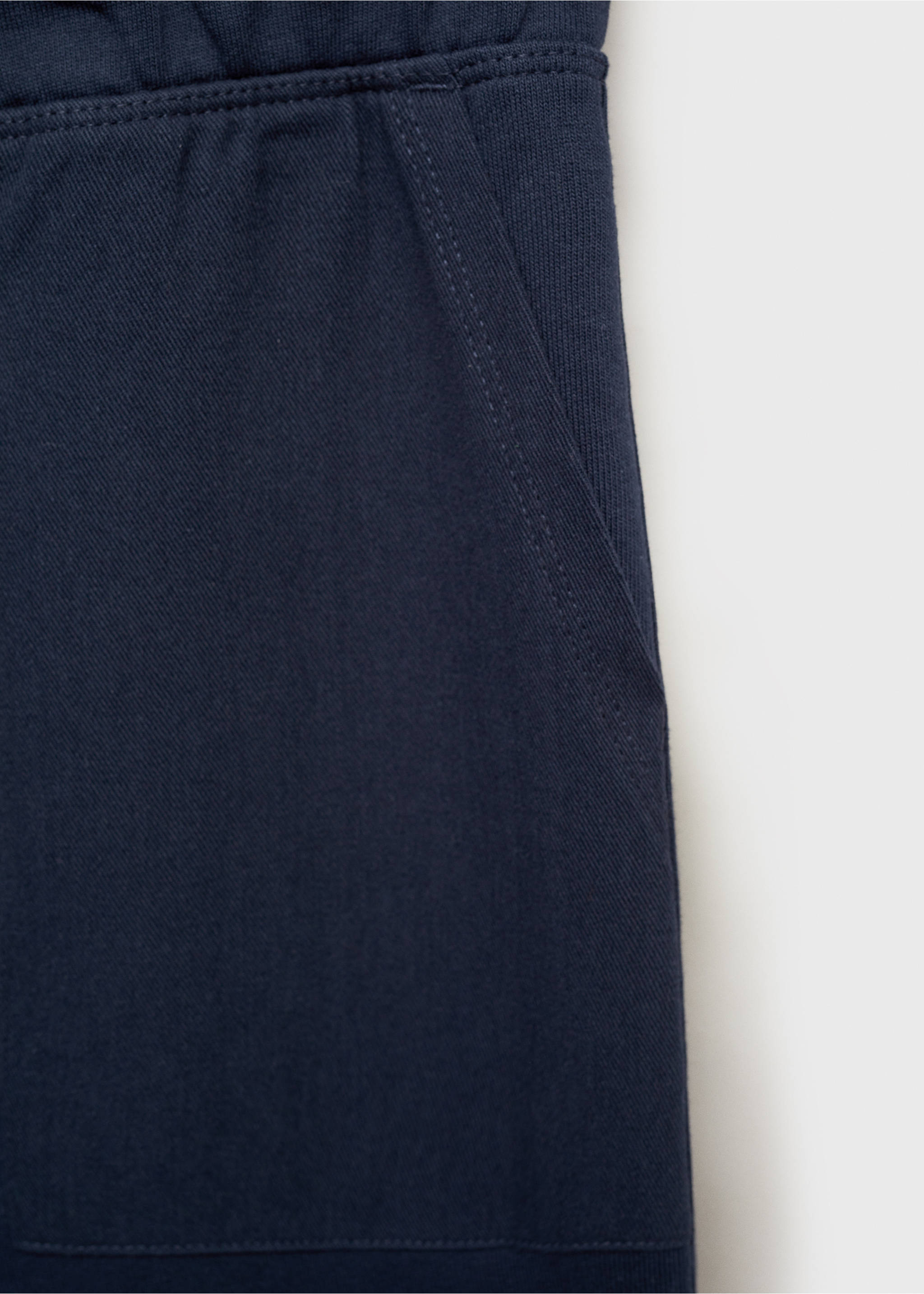 Jogger-Hose aus Baumwolle - Detail des Artikels 0, Dunkles Marineblau. Ref: 87025138-00.