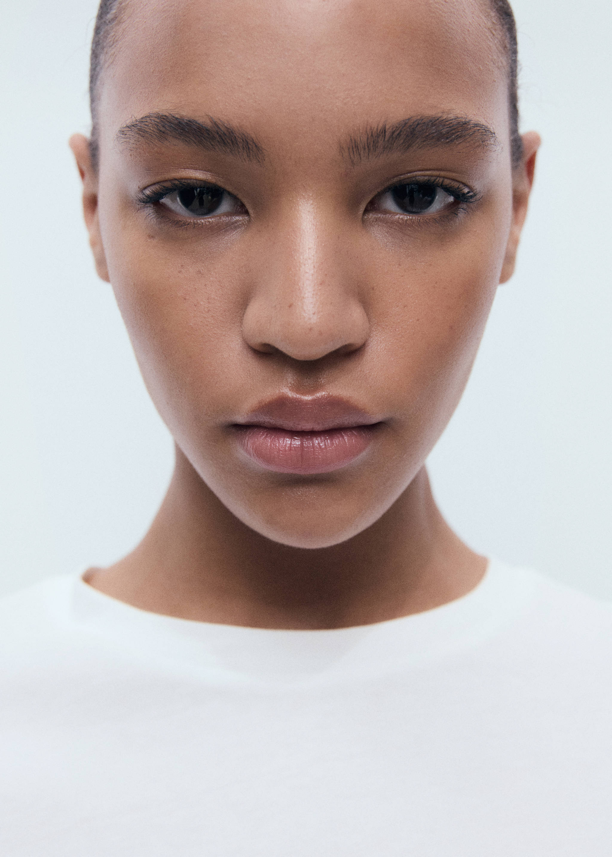 Short-sleeved t-shirt with crochet pocket - Details of the article 1