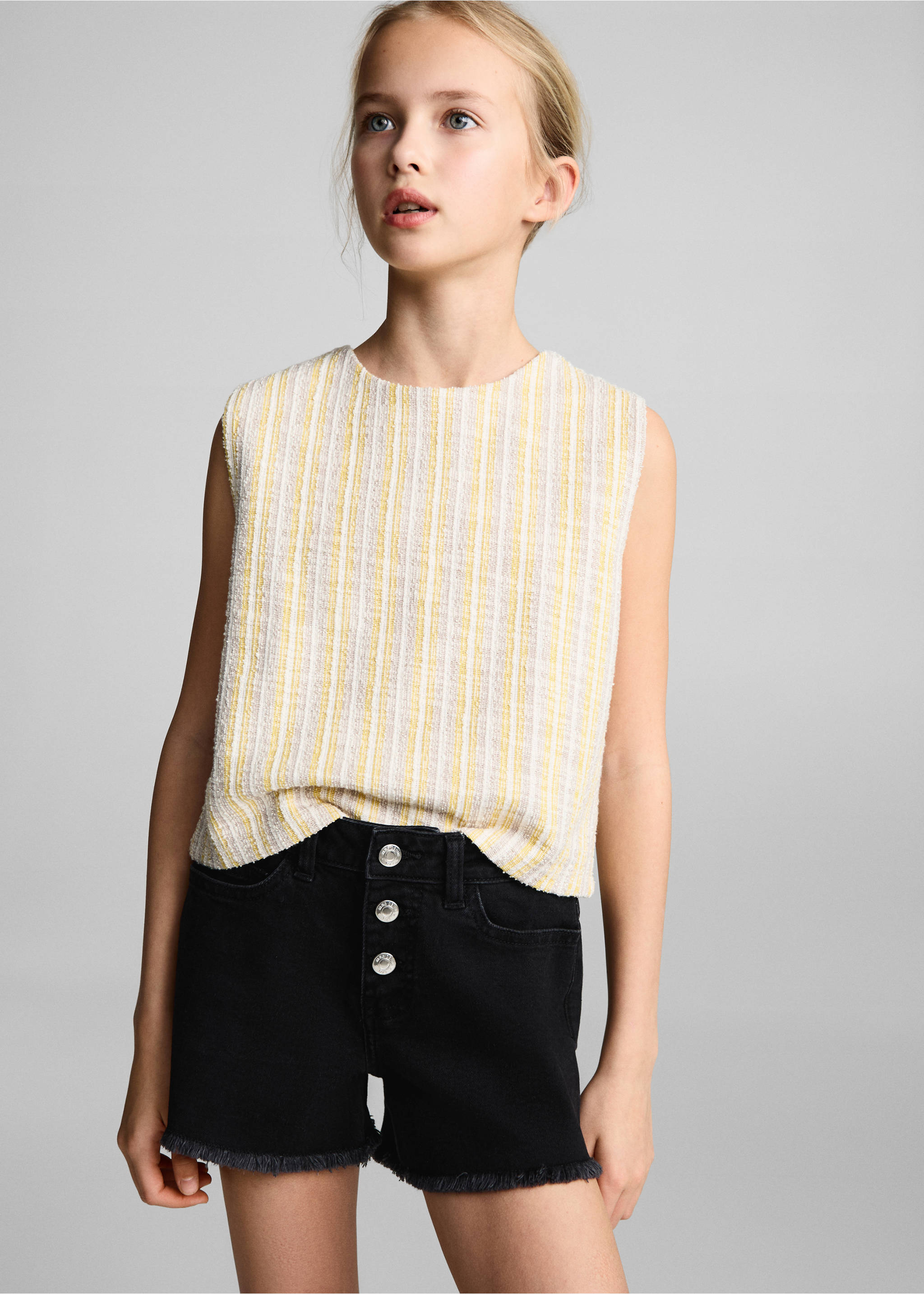 Black denim shorts with a button fly and frayed hems, Black denim. Ref: 87025947-00.