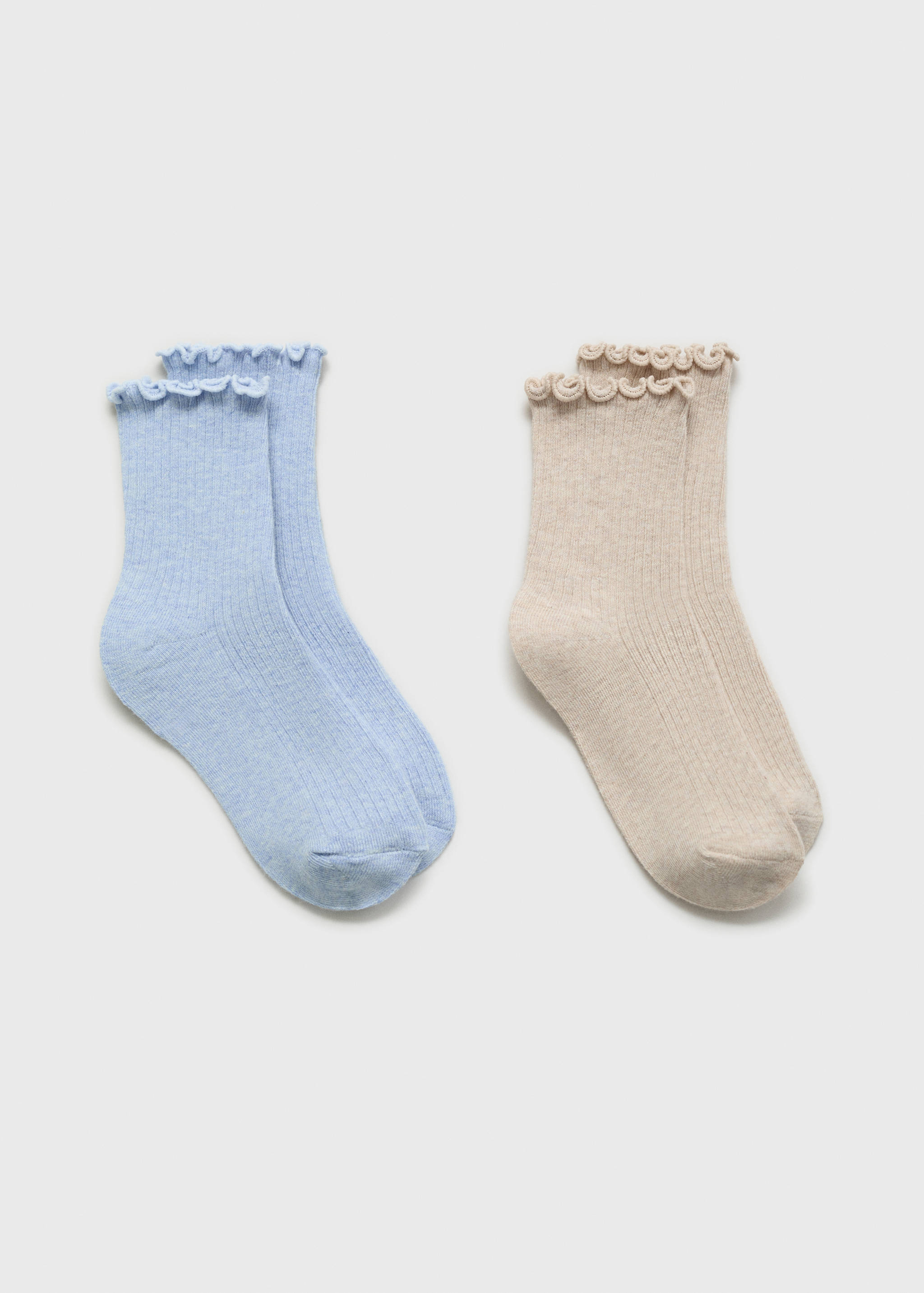 Two pairs of ribbed socks in light blue and beige with ruffled cuffs.