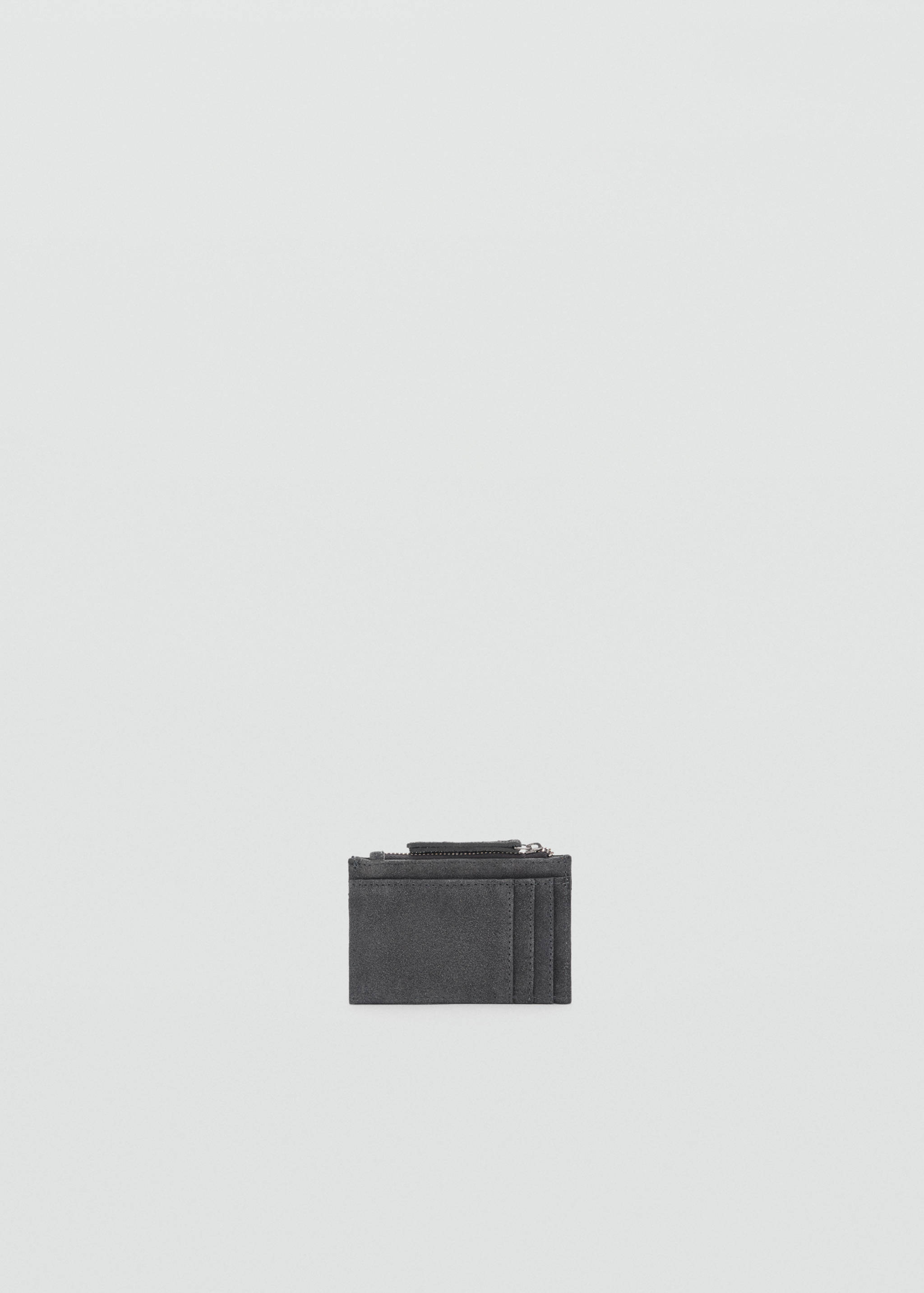 Dark grey coin purse with card slots and a top zip closure.