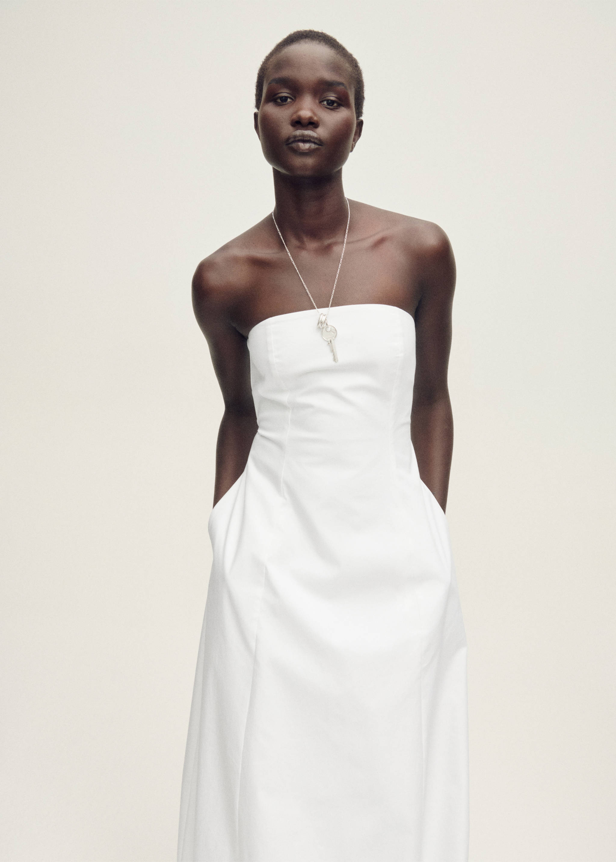 Strapless dress with puffed hem - Medium plane