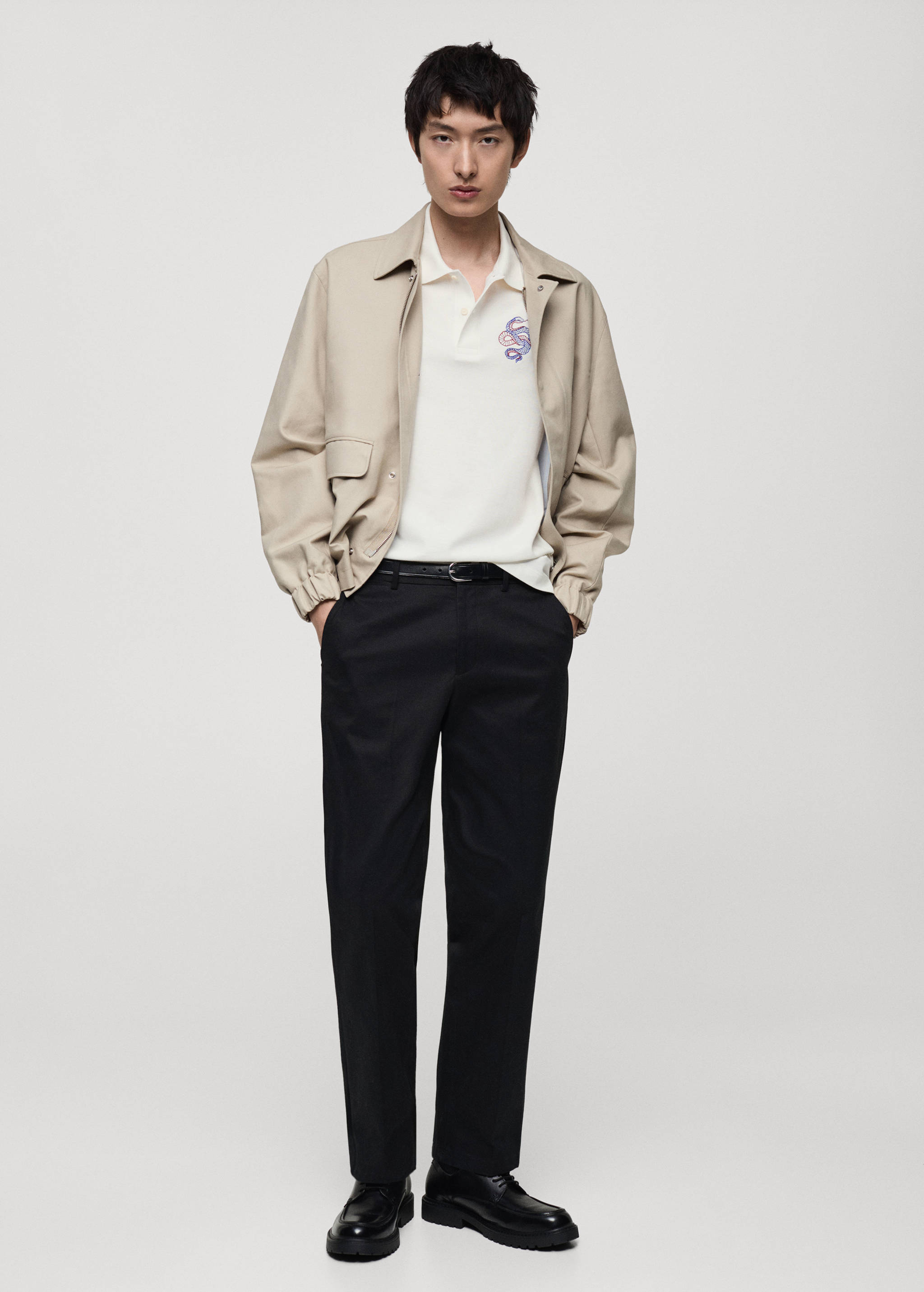 100% cotton polo shirt with embroidered graphic on the chest - General plane