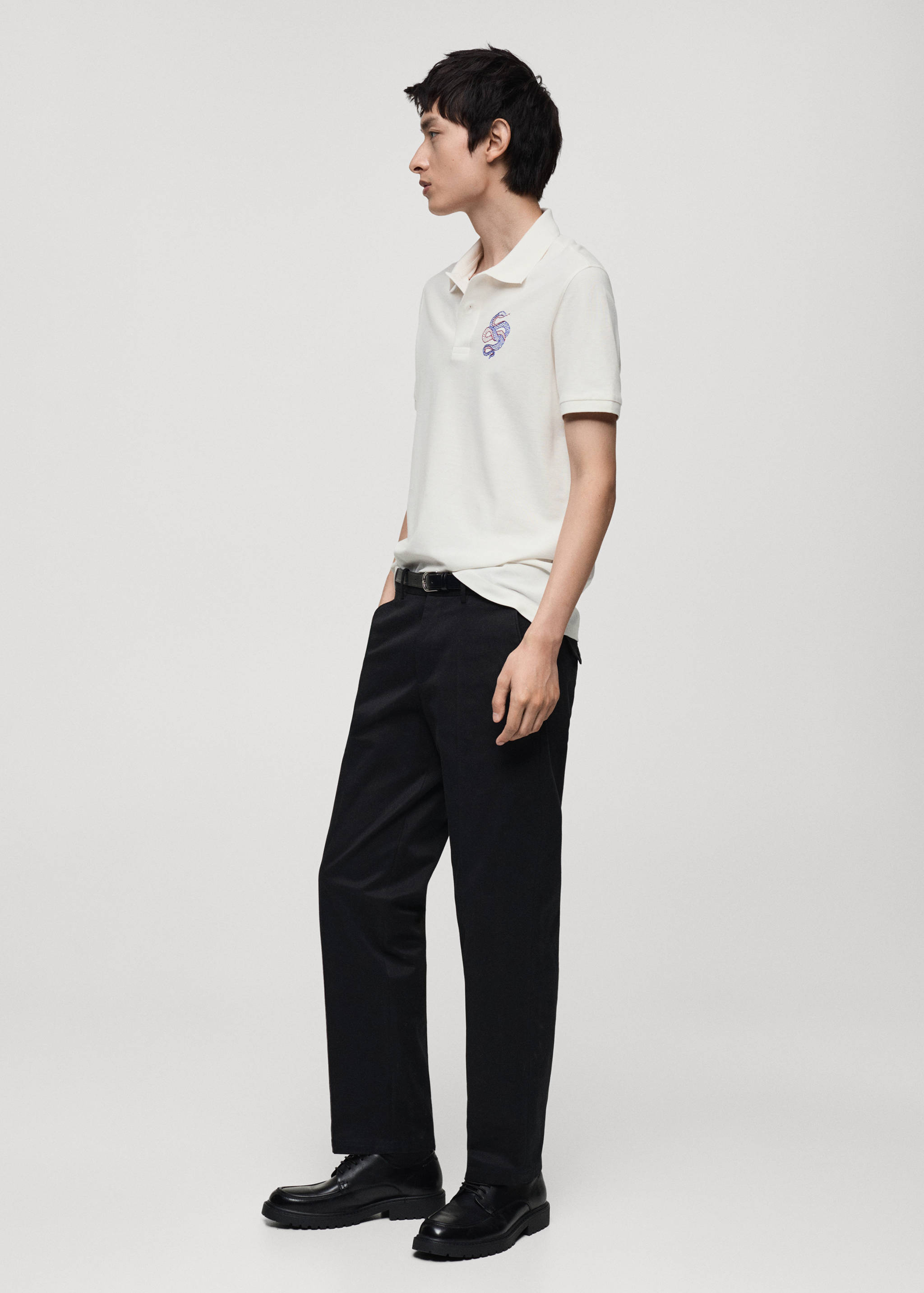 100% cotton polo shirt with embroidered graphic on the chest - Details of the article 2