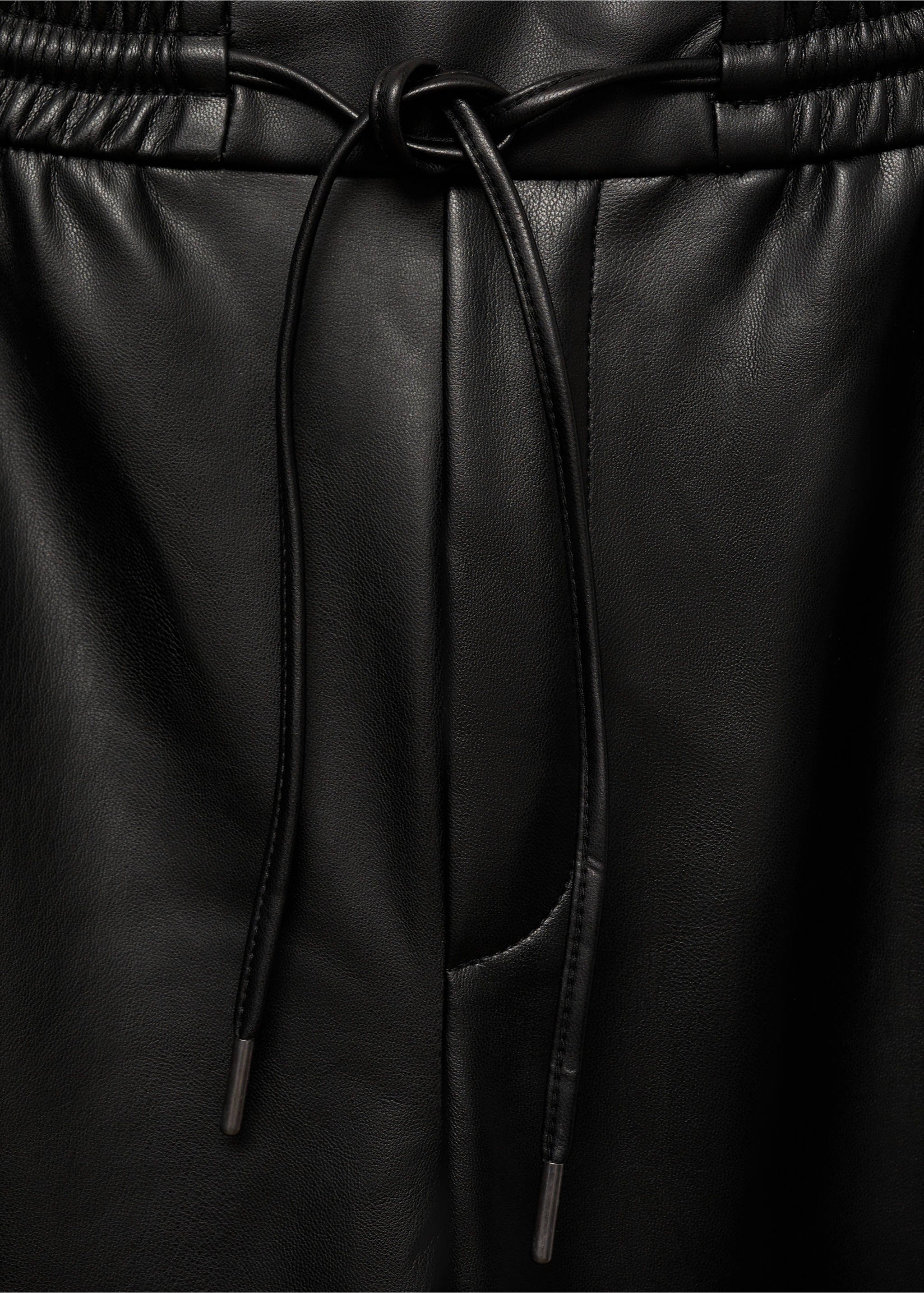 Faux-leather trousers with elastic waist - Details of the article 8, Black. Ref: 87030436-00.
