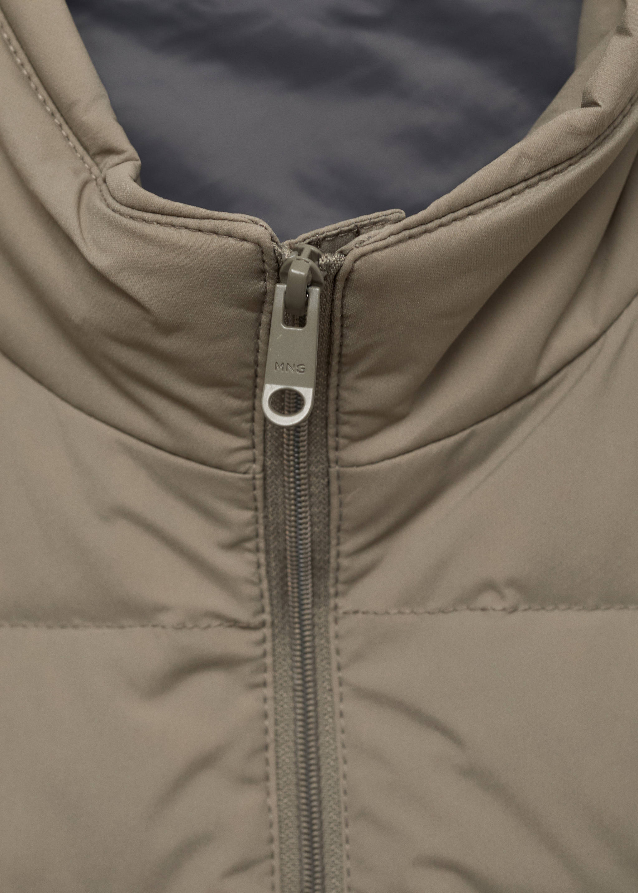 Quilted waistcoat with down and feather filling - Details of the article 8