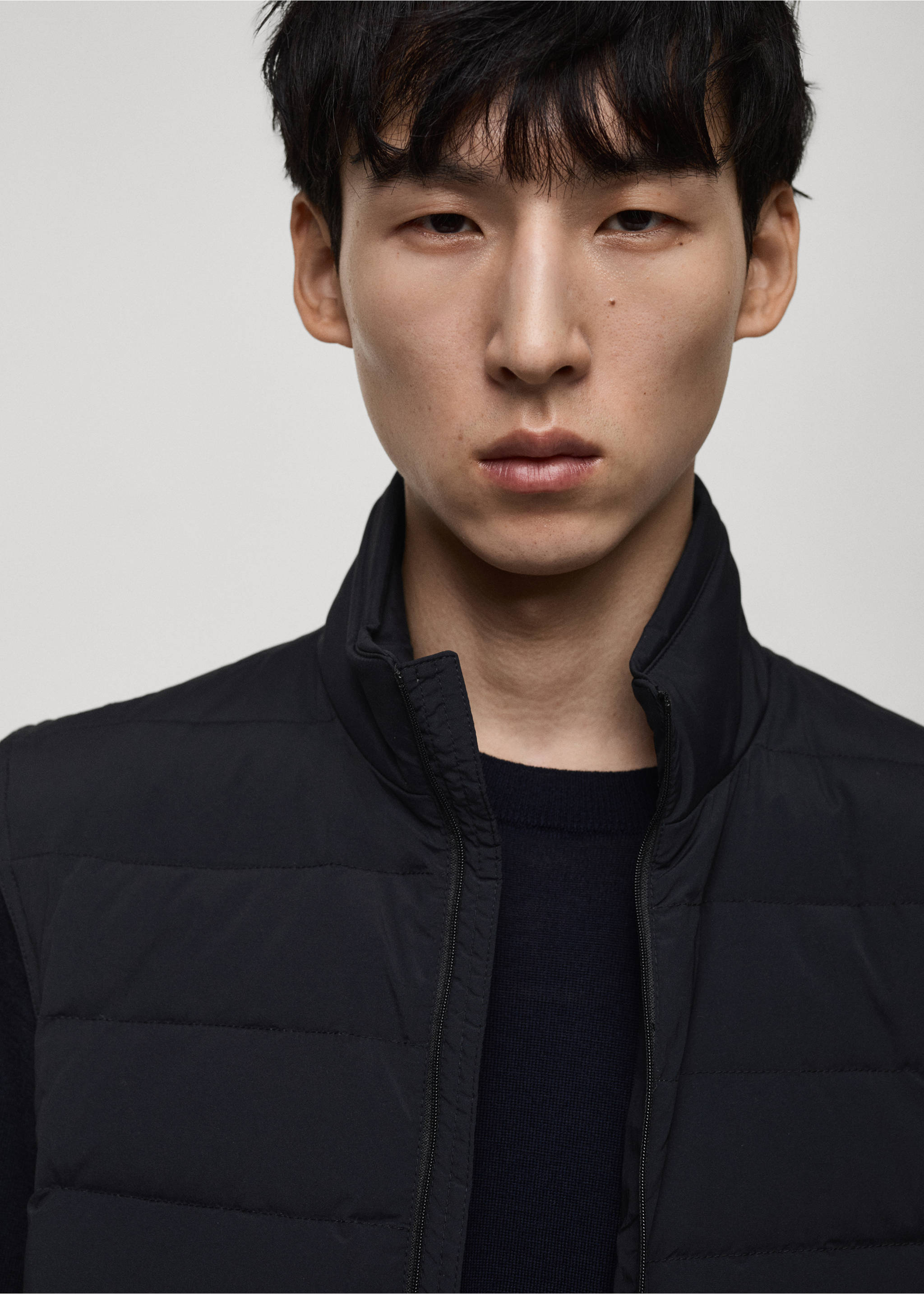 Quilted waistcoat with down and feather filling - Details of the article 1, Dark Navy. Ref: 87030576-00.