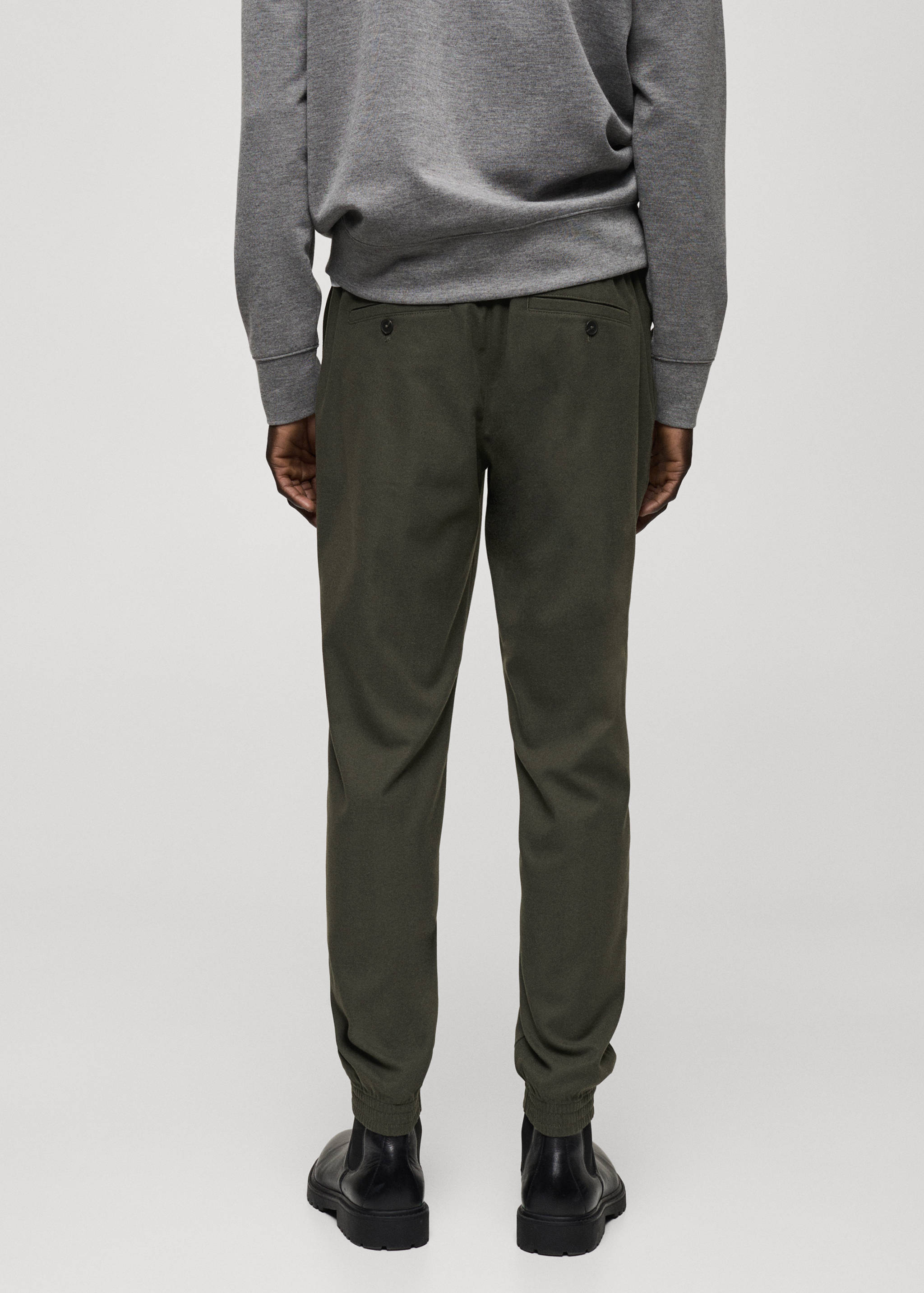 Cotton pants with adjustable drawstring - Reverse of the article