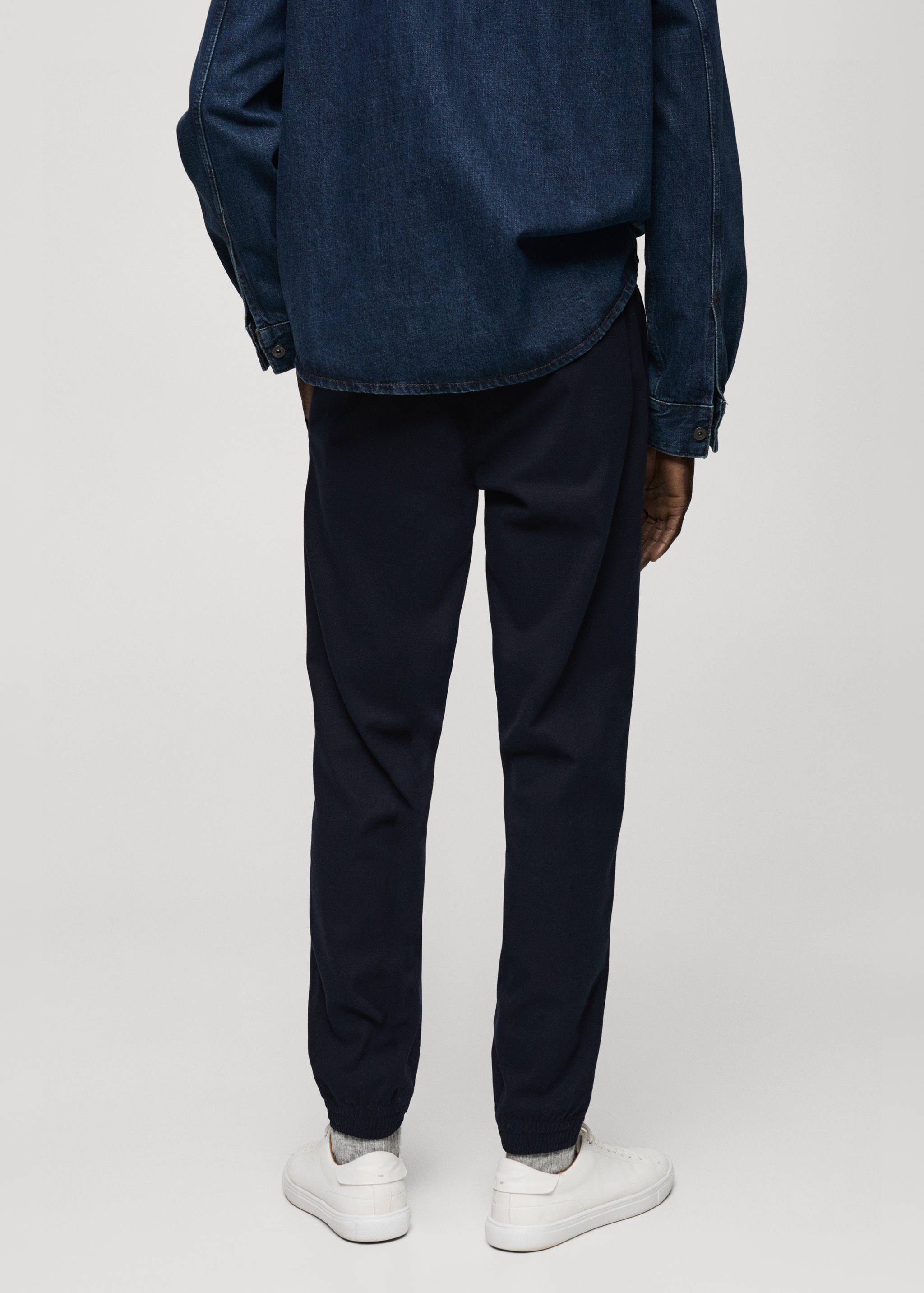 Cotton pants with adjustable drawstring - Reverse of the article