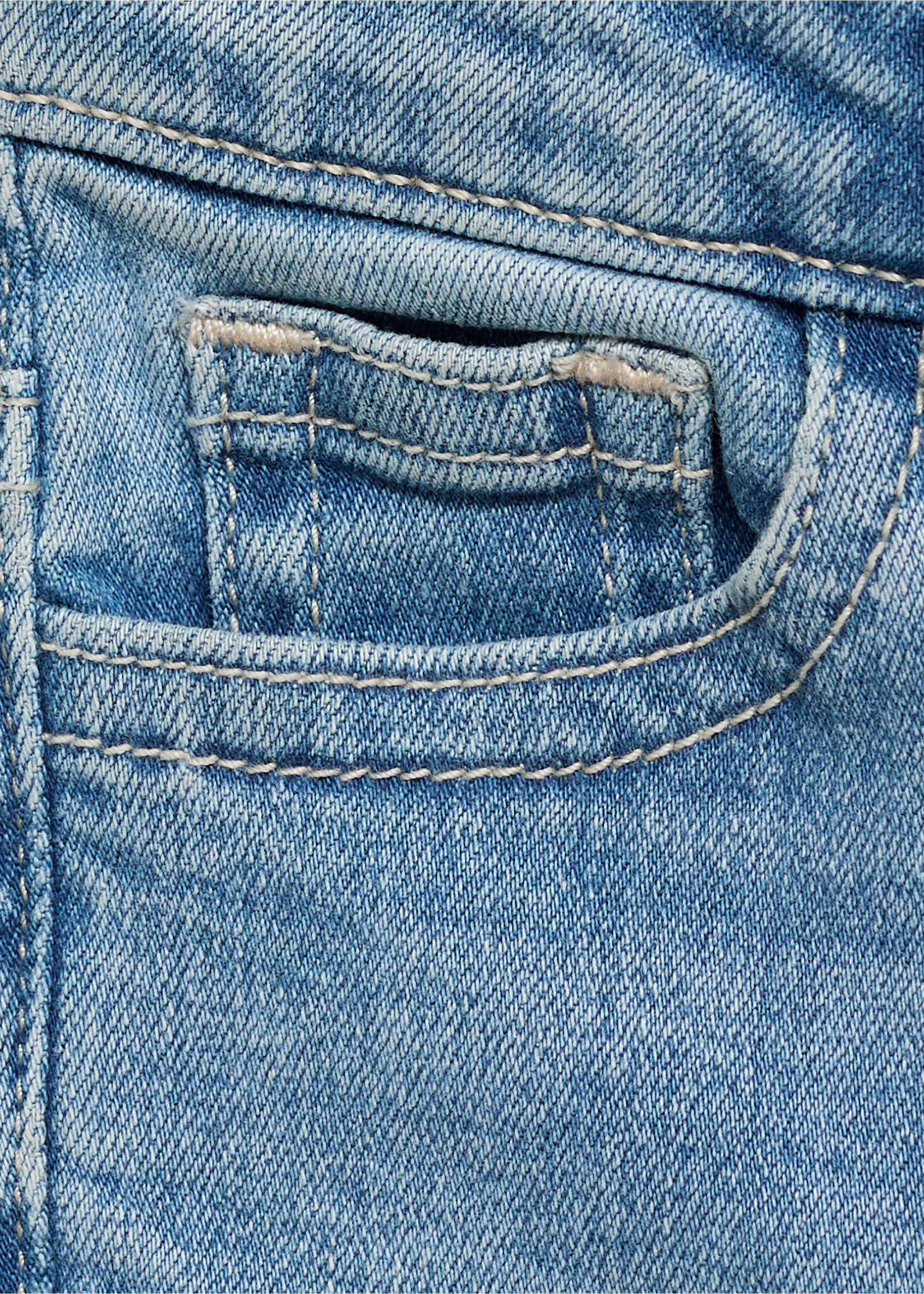 Flared-Jeans mit ausgefranstem Saum - Detail des Artikels 8, Mittelblau. Ref: 87030619-00.