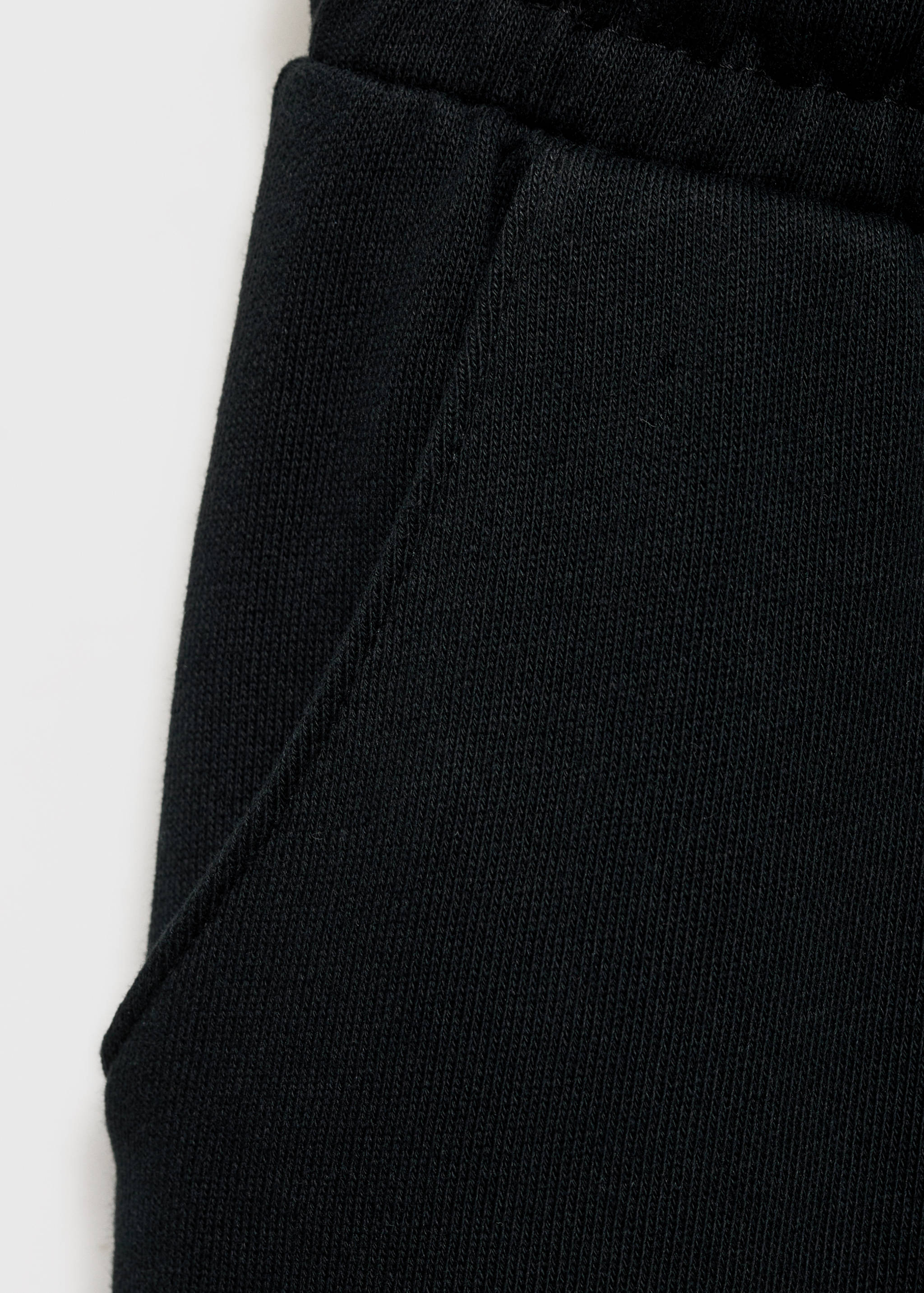 Cotton jogger-style trousers - Details of the article 0