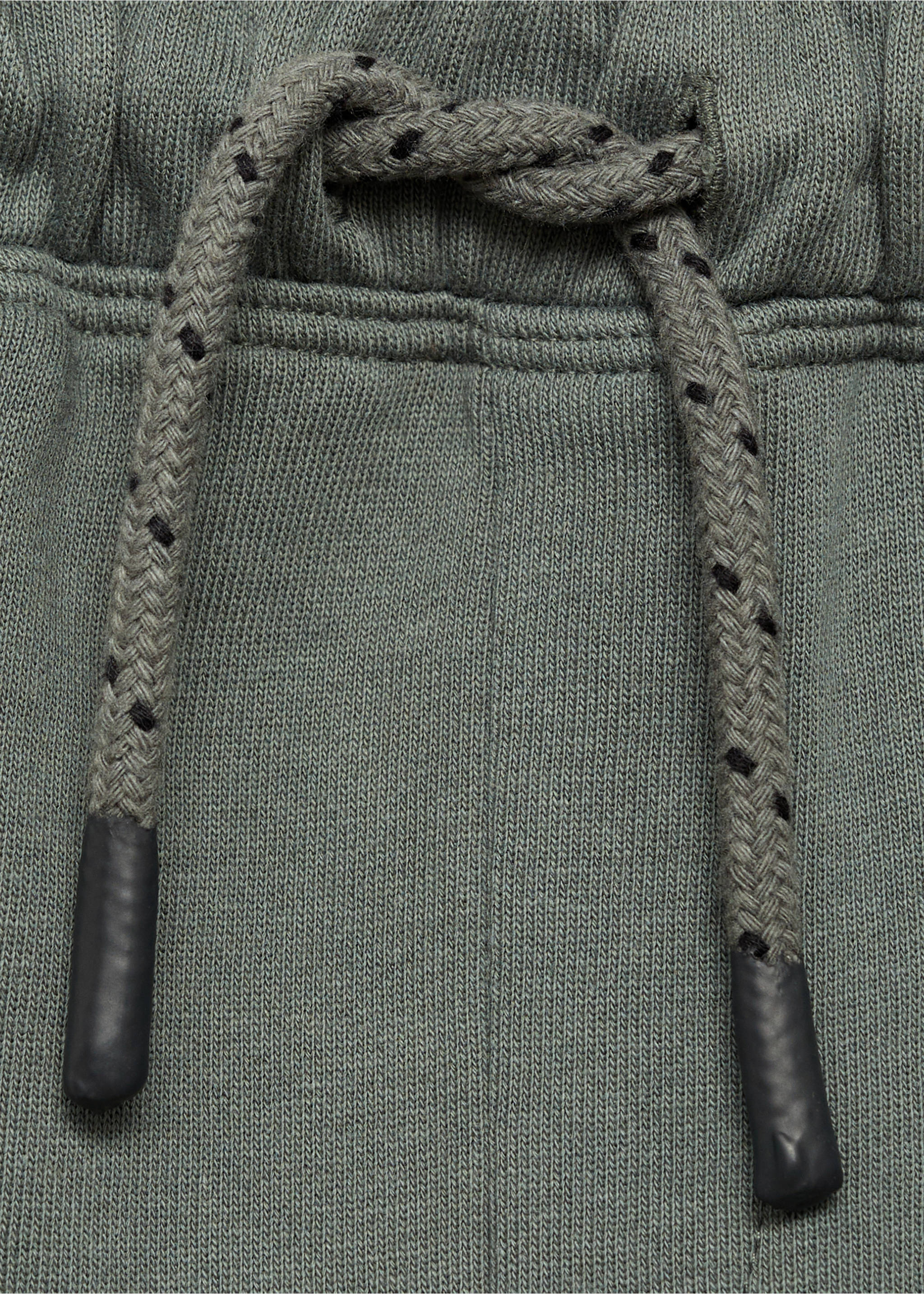 Cargo jogger trousers - Details of the article 8, Green. Ref: 87031049-00.