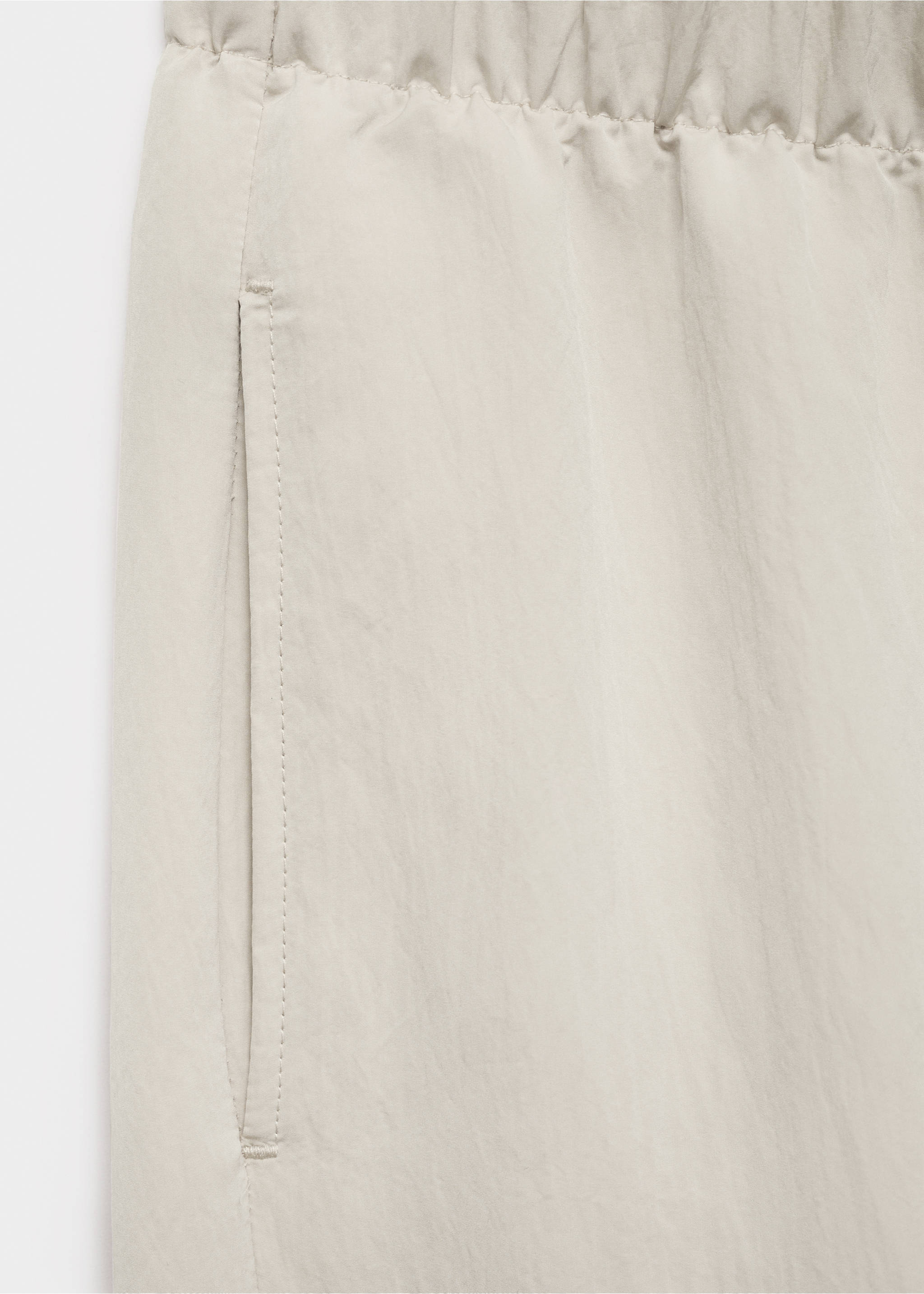 Pleated jogger trousers - Details of the article 8, Ecru. Ref: 87032540-00.