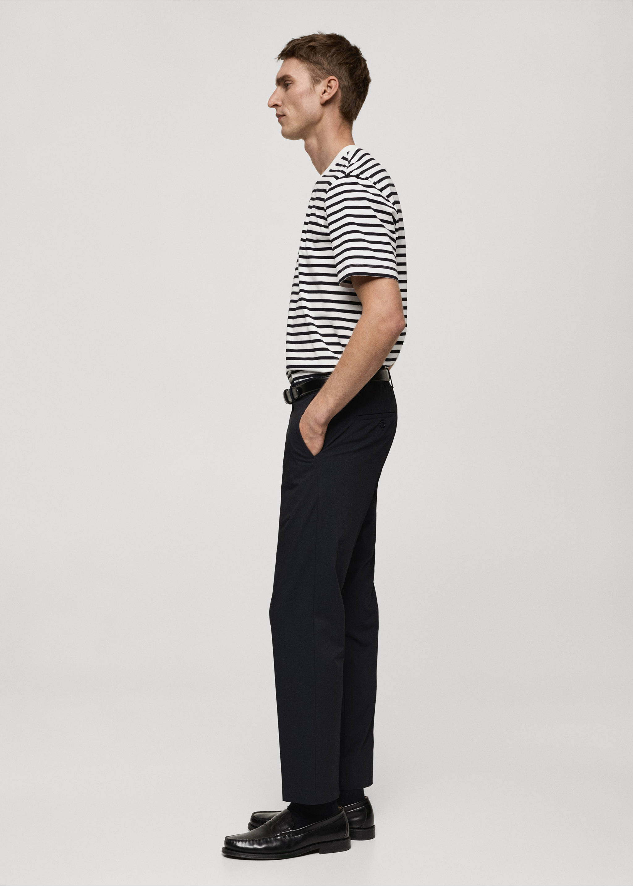 Dark straight trousers worn with a striped t-shirt and loafers., Dark Navy. Ref: 87032889-00.
