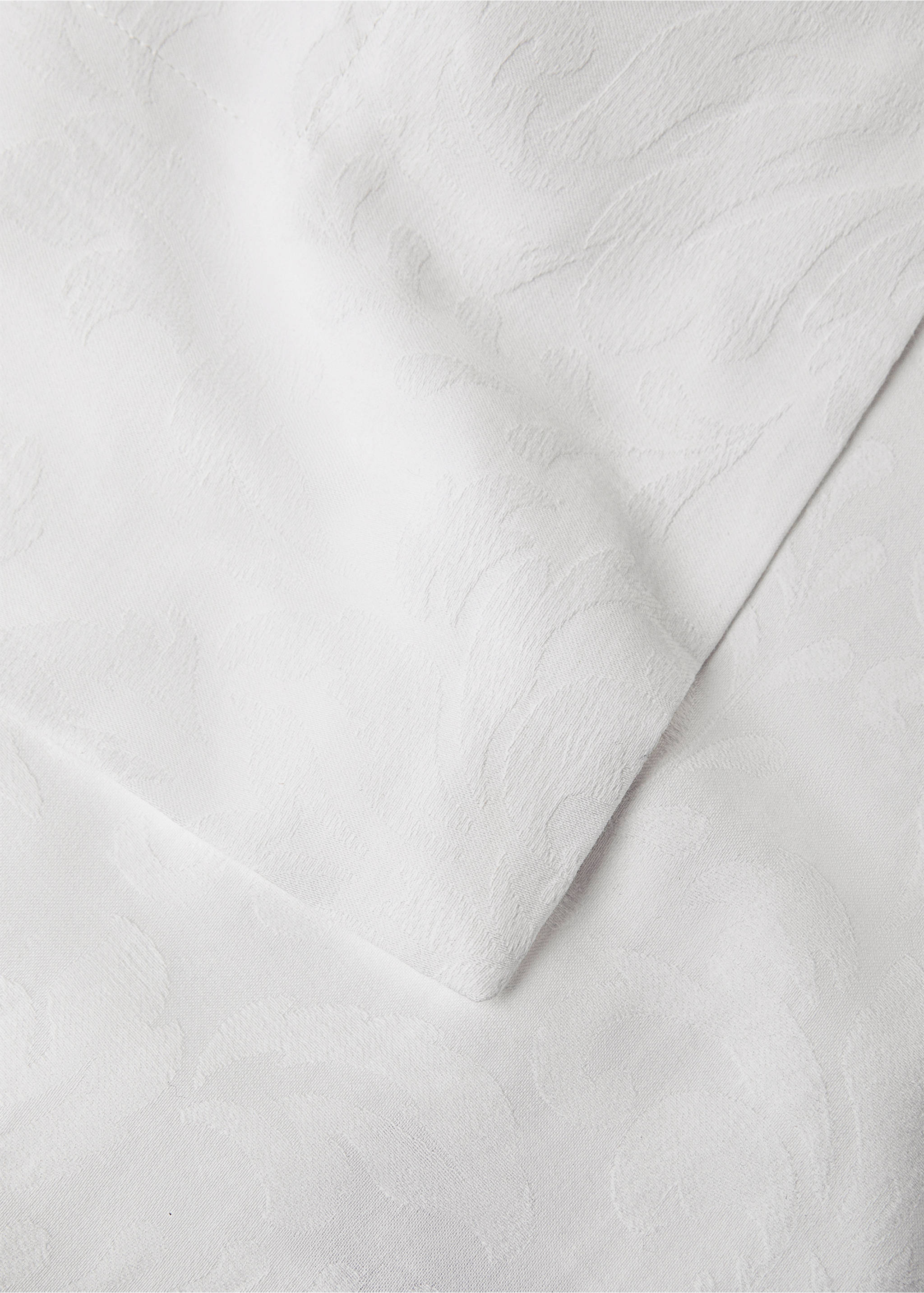 Floral jacquard cotton tablecloth for 6 to 8 guests - Details of the article 1, White. Ref: 87032960-00.