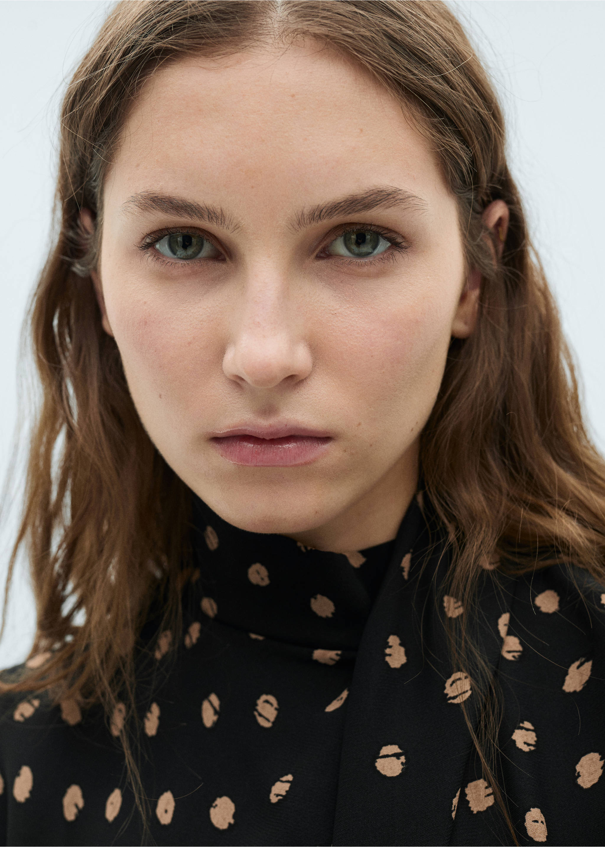 Polka-dot blouse with draped collar - Details of the article 1, Black. Ref: 87034071-00.