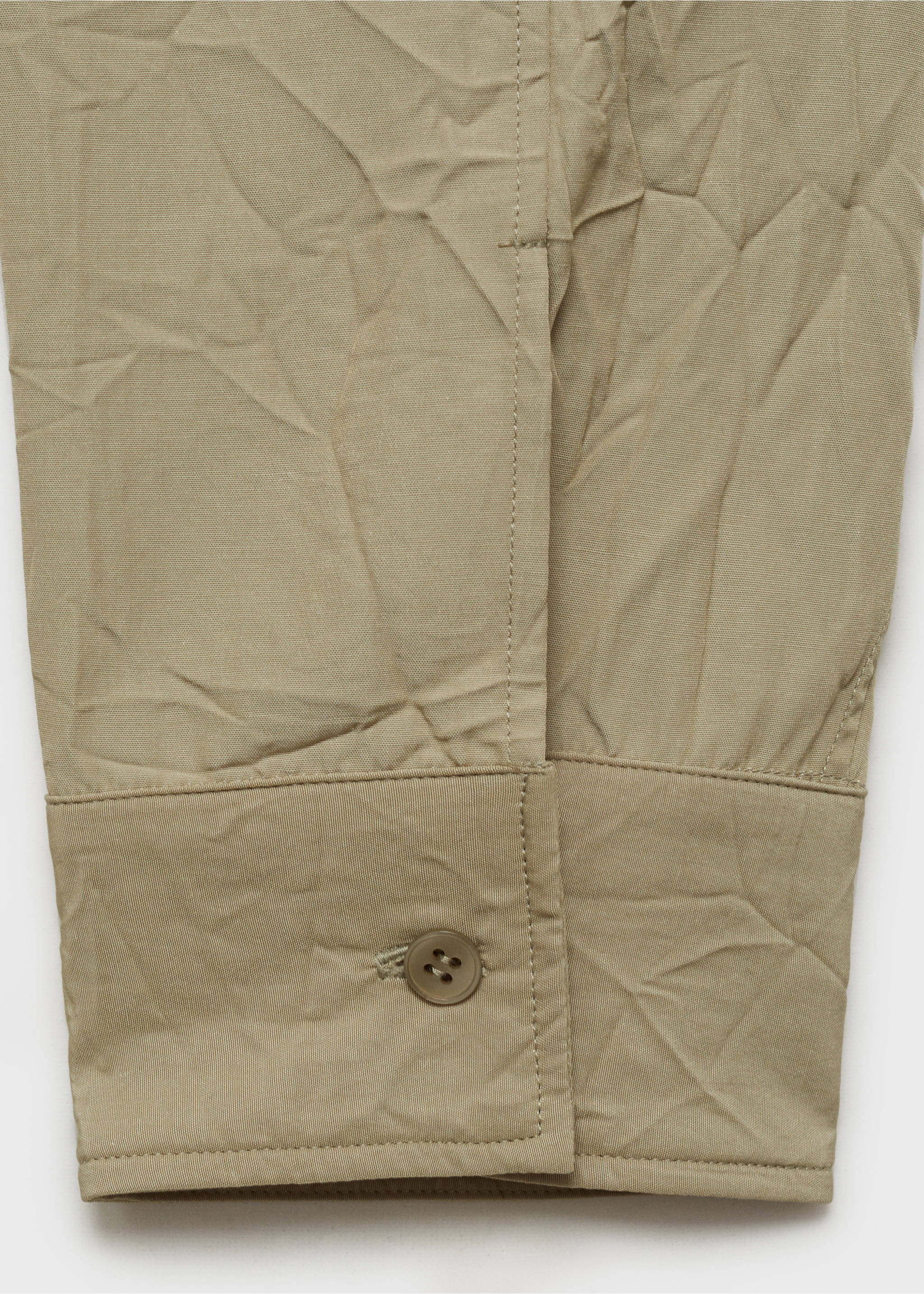 Crew-neck shirt with creased effect - Details of the article 0, Pastel Green. Ref: 87034425-00.