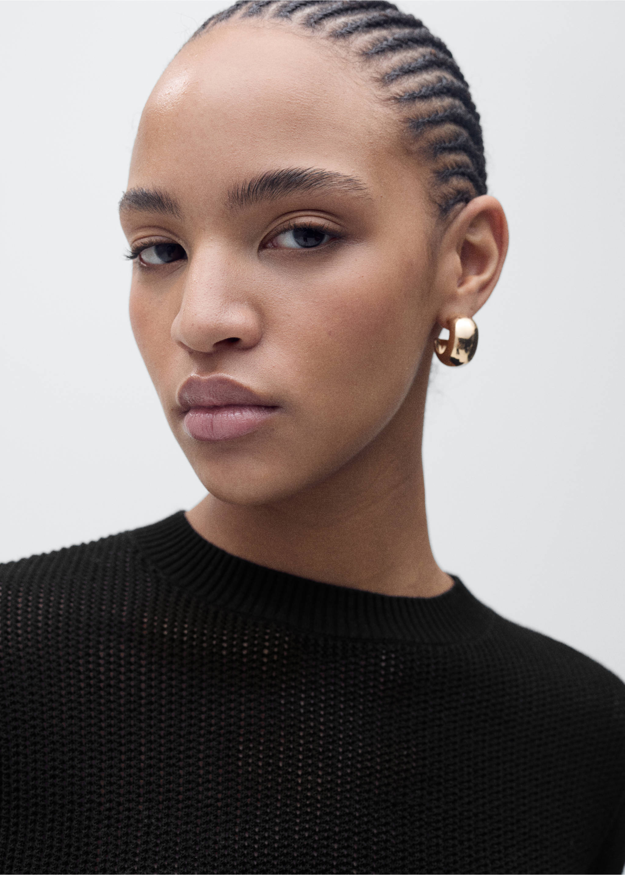 Short-sleeved openwork knitted sweater - Details of the article 1, Black. Ref: 87035747-00.