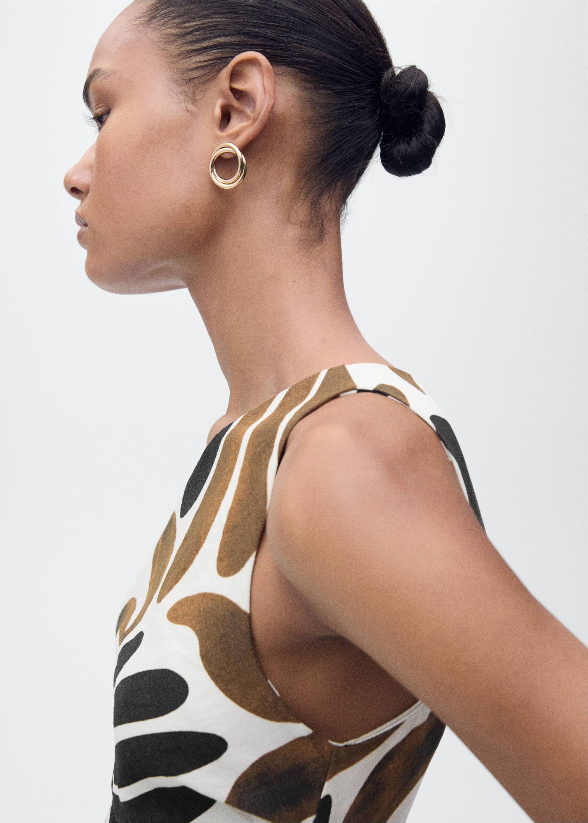 Printed dress with asymmetrical neck - Details of the article 1, Brown. Ref: 87037182-00.