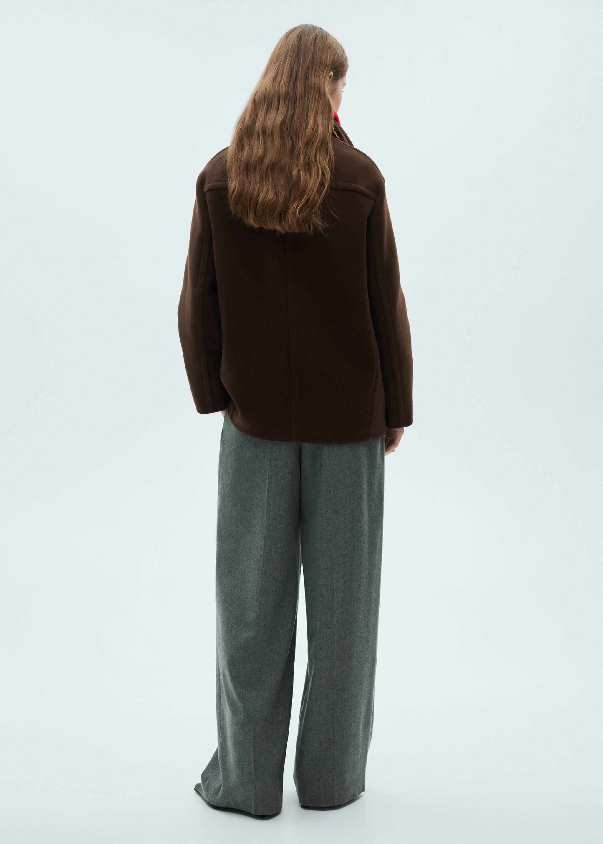 Short virgin wool coat - Reverse of the article