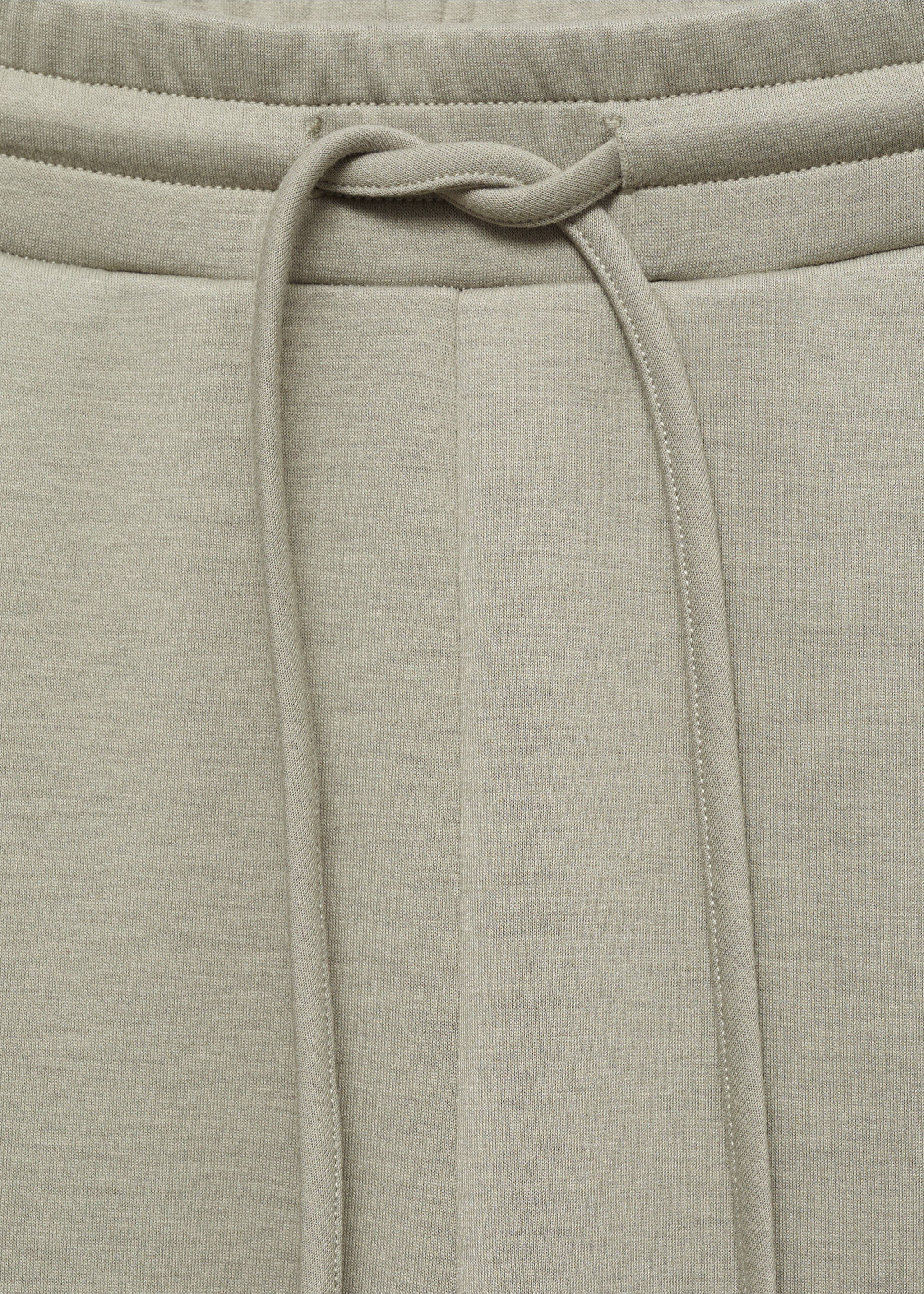 Wideleg-Jogger-Pants mit Abnähern - Detail des Artikels 8, Khaki. Ref: 87043275-00.