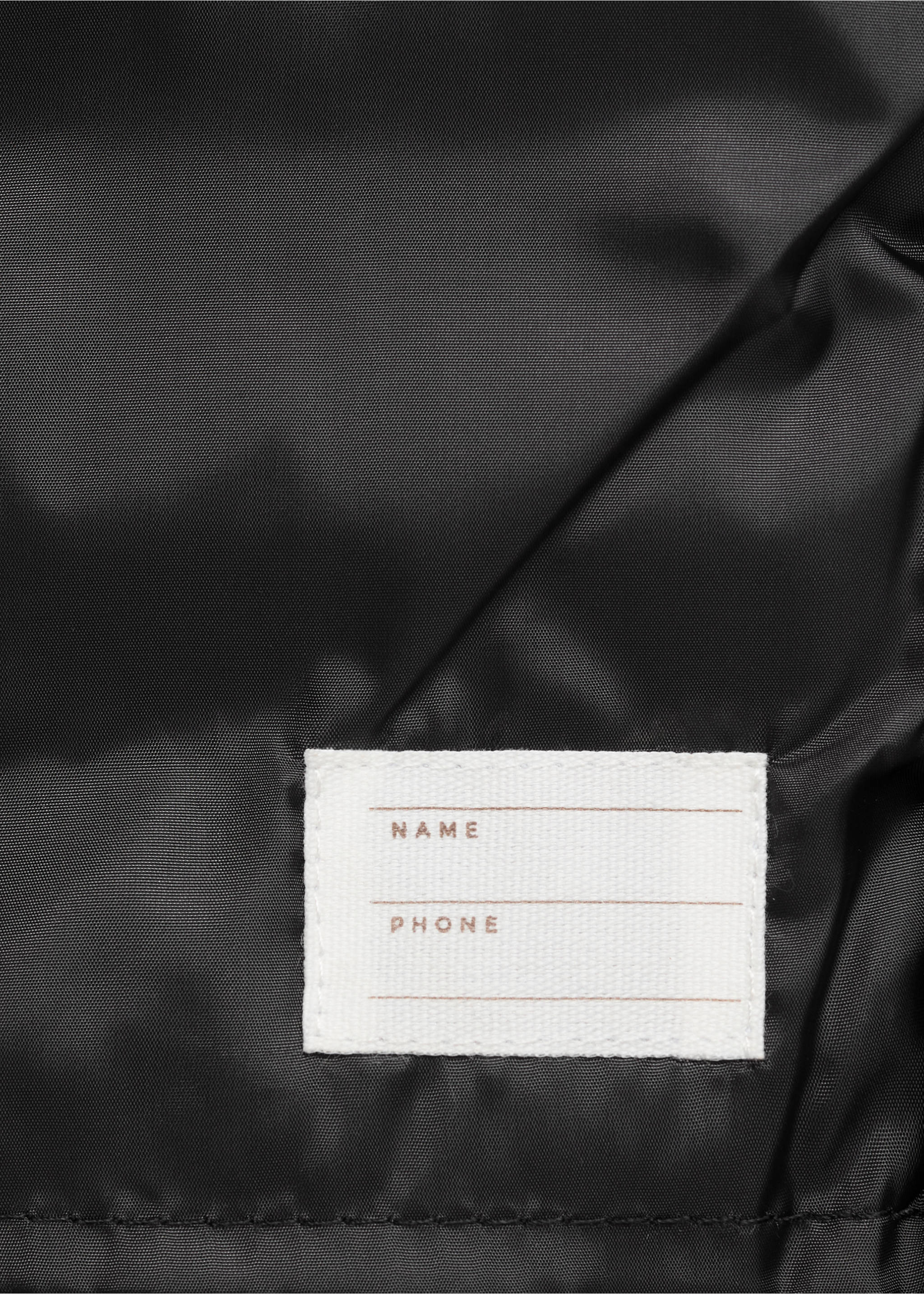 Gilet matelassé à capuche - Détail de l'article 0, Noir. Ref: 87044405-00.