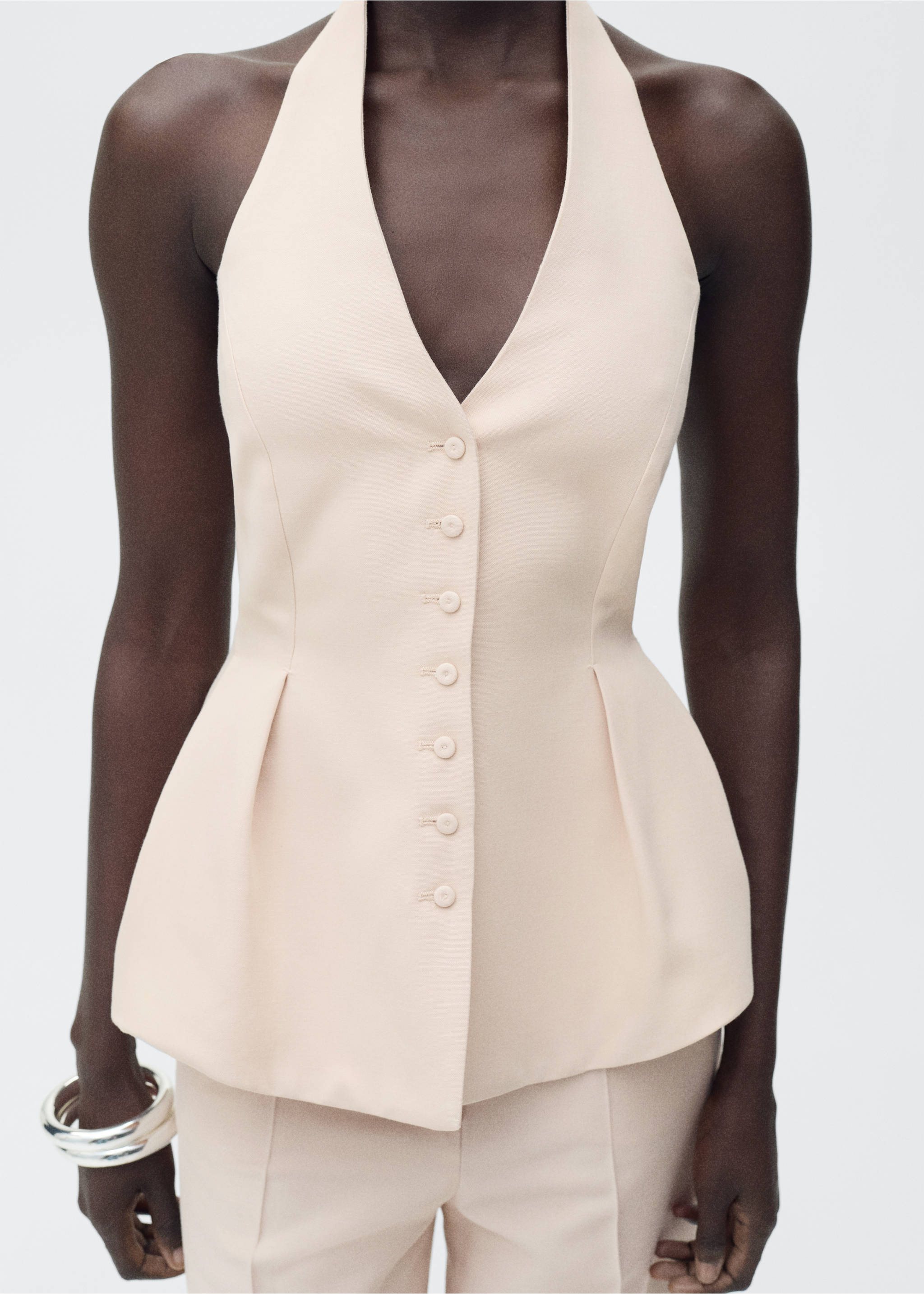 Halter-neck waistcoat with pleats - Details of the article 1, Nude. Ref: 87045769-00.