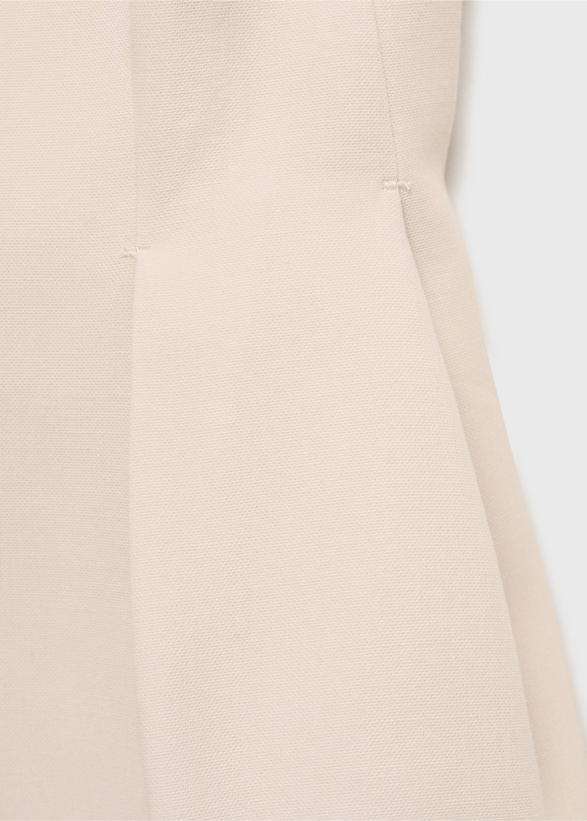 Halter-neck waistcoat with pleats - Details of the article 0, Nude. Ref: 87045769-00.