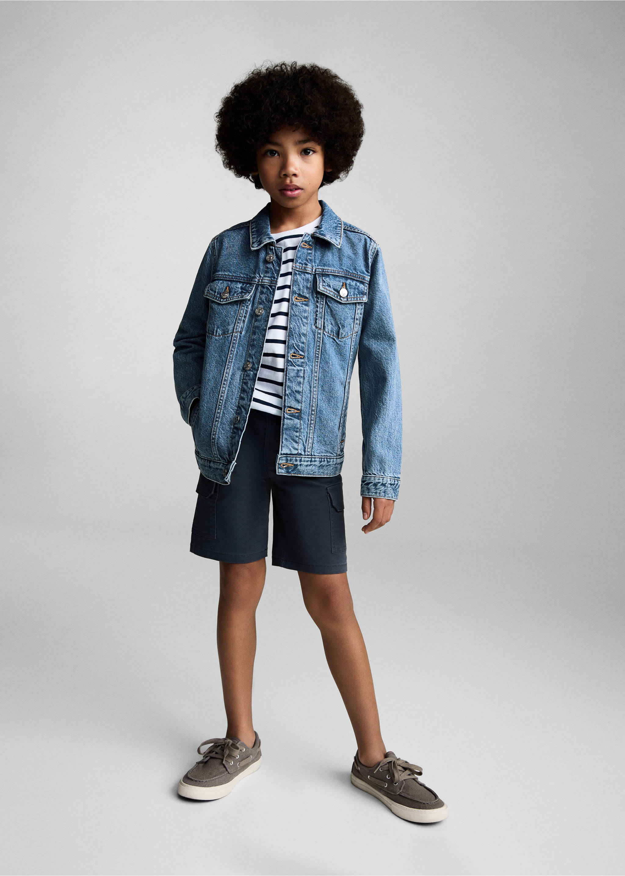 Blue denim jacket with a classic collar and button front, styled with a striped t-shirt and cargo shorts., Medium Blue. Ref: 87045952-00.