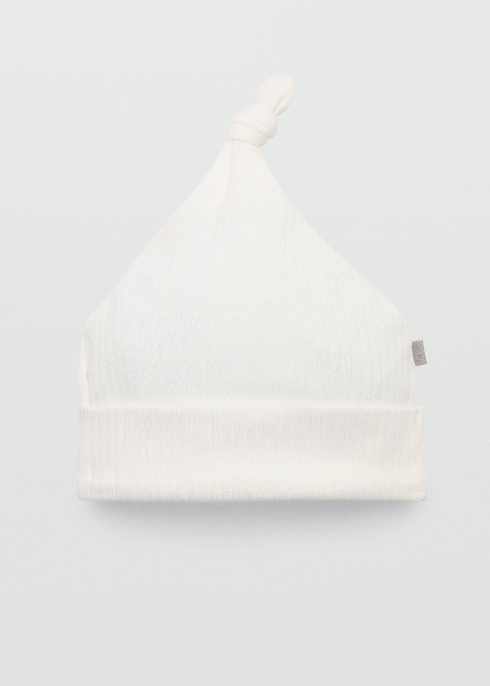 Mössa med knytdetaljer - Artikel utan modell