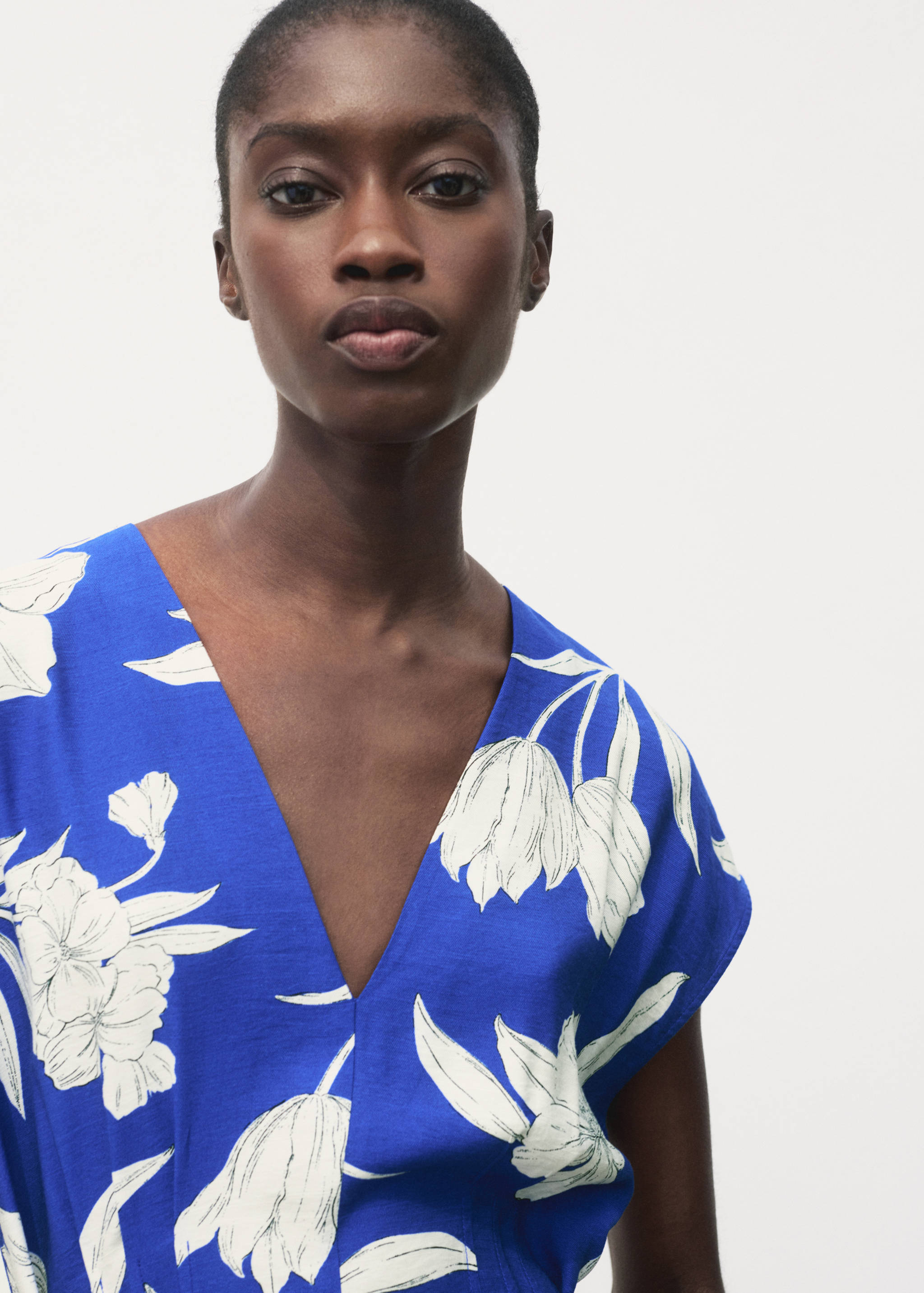 Printed long jumpsuit with belt - Details of the article 1