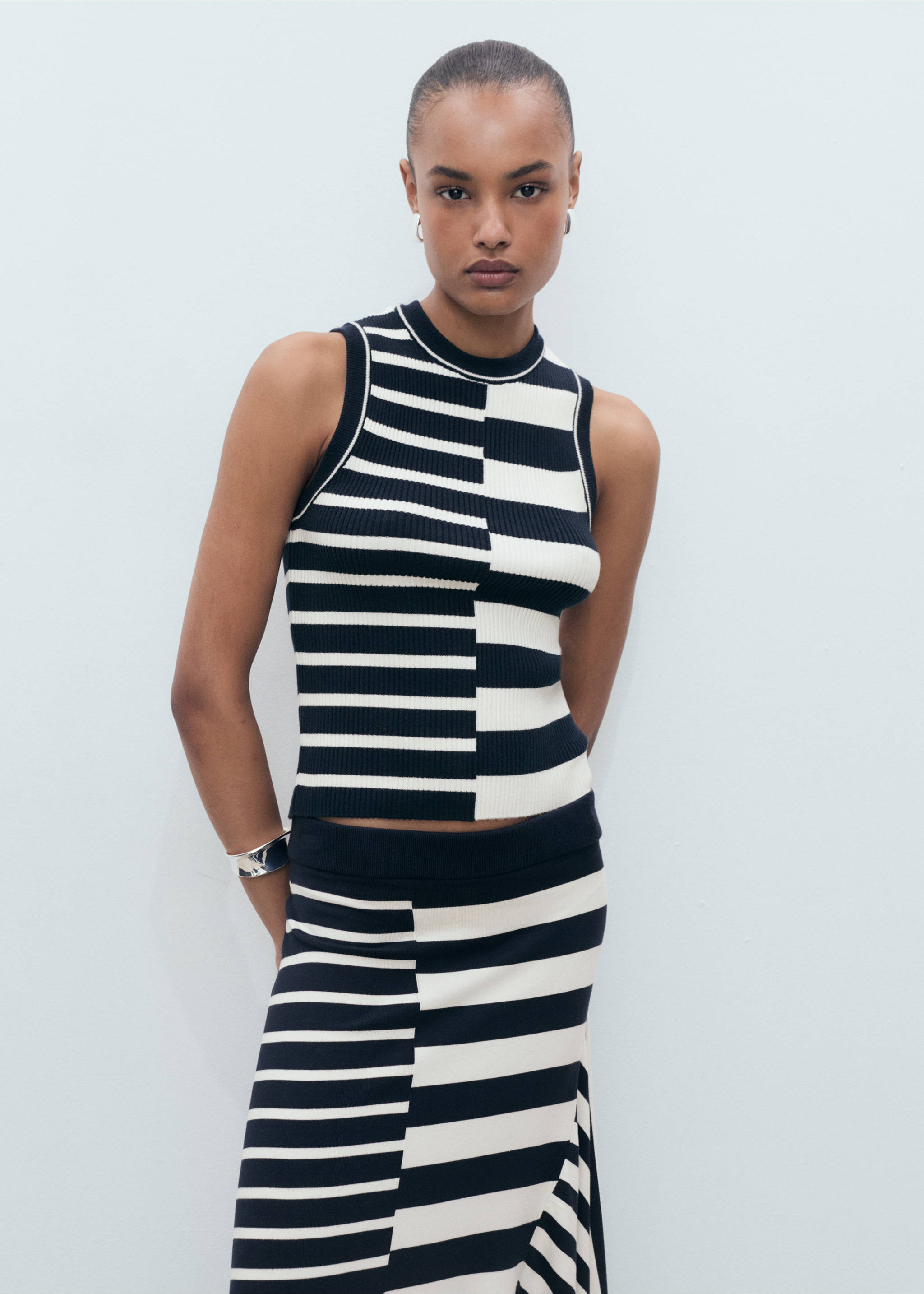 Asymmetrical striped knit skirt - Details of the article 1, Dark Navy. Ref: 87047192-00.