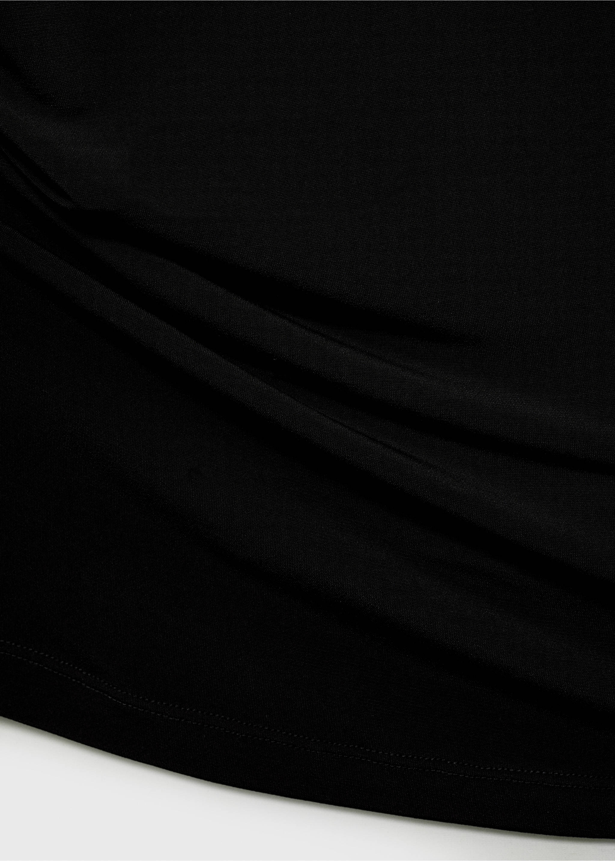 Asymmetrical top with metallic appliqué - Details of the article 8, Black. Ref: 87047716-00.