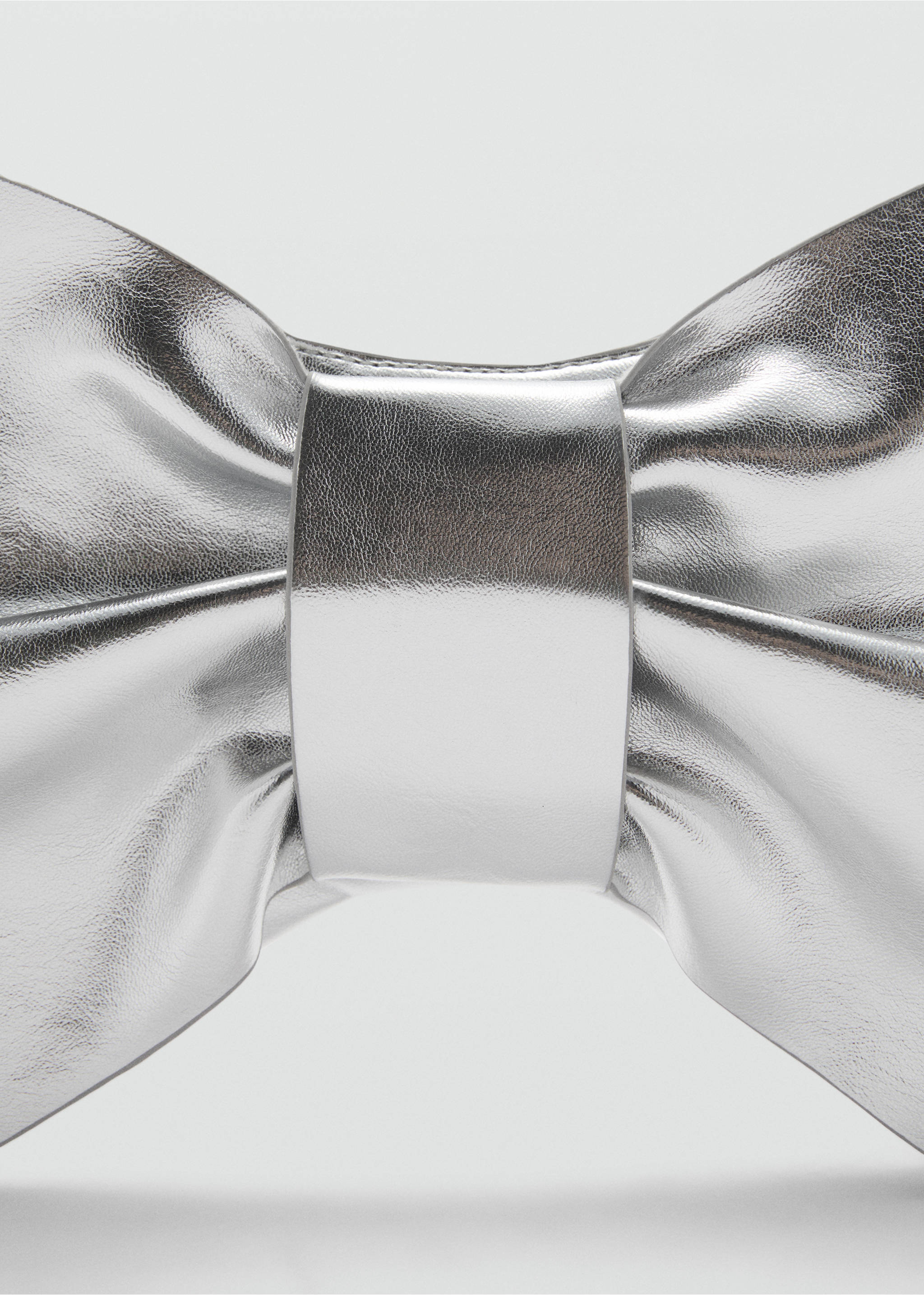 Metallic bow bag - Details of the article 1, Silver. Ref: 87050263-00.