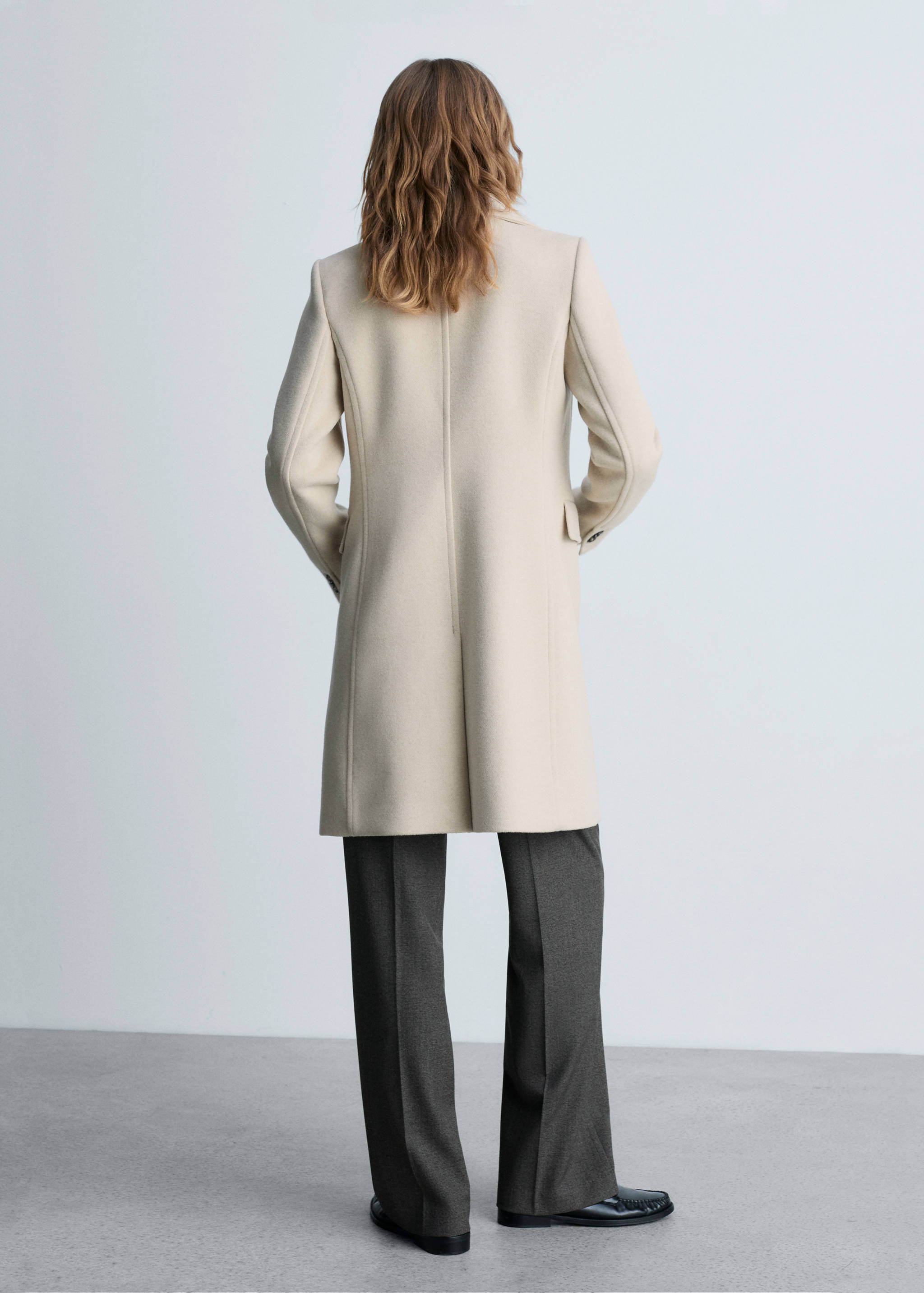Double-breasted wool coat - Reverse of the article