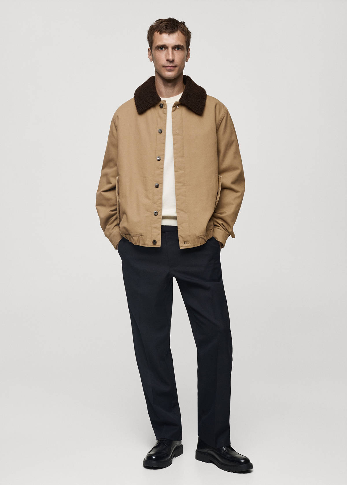 Quilted jacket with sheepskin collar