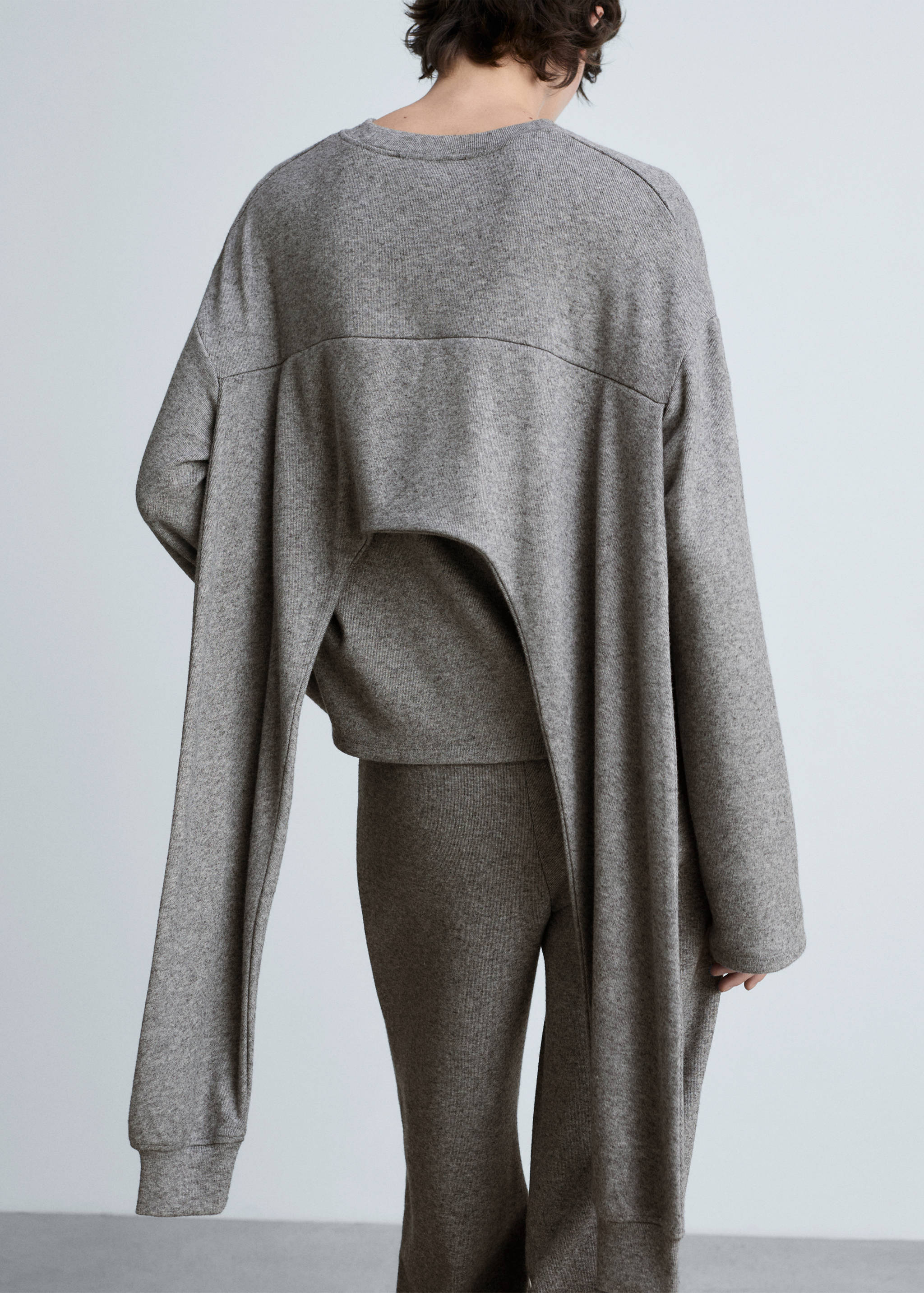 Sweatshirt with decorative sleeve - Reverse of the article