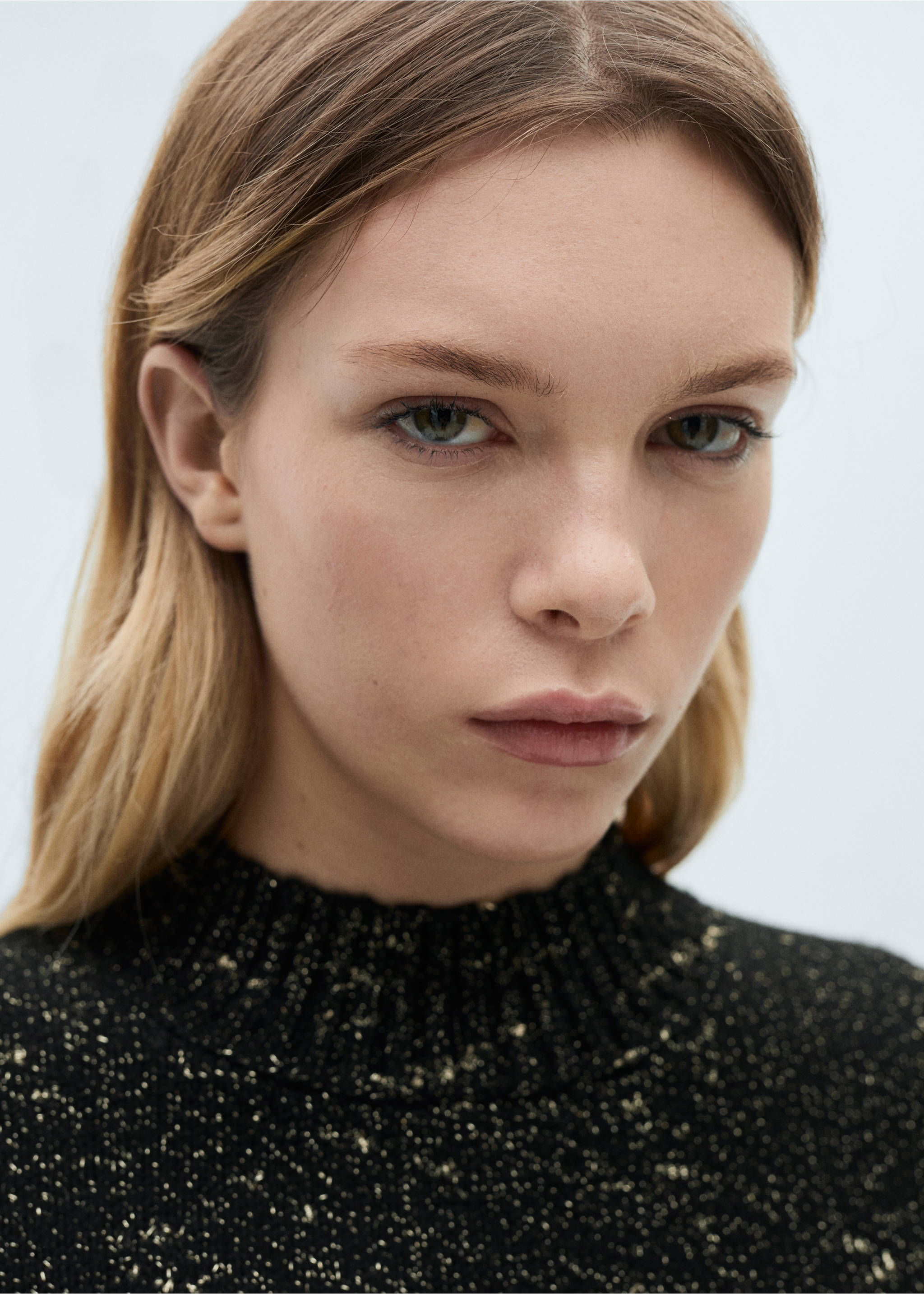 Lurex sweater with perkins neck - Details of the article 1, Black. Ref: 87050651-00.