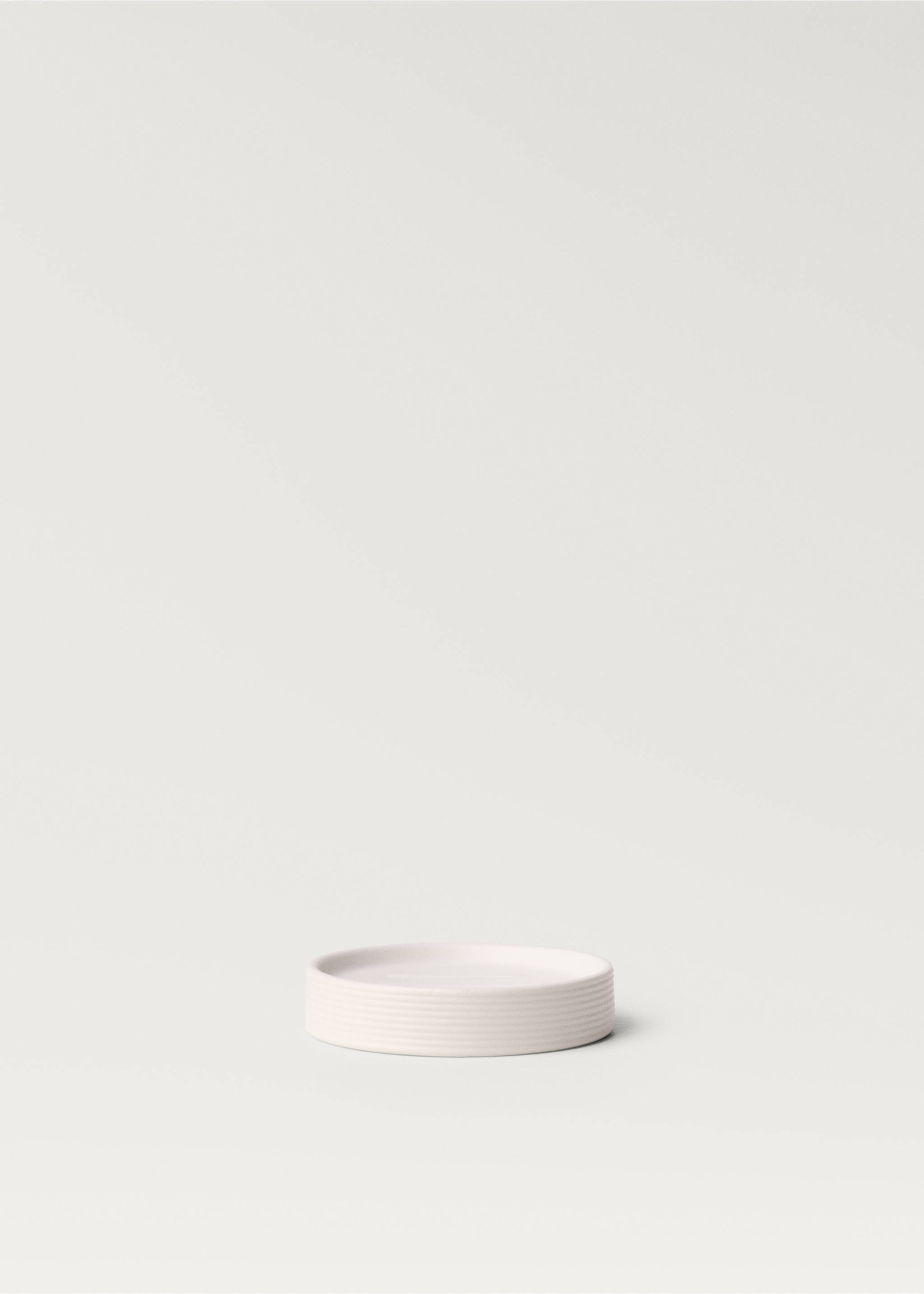 Pale pink round soap dish with subtle horizontal ribbing., White. Ref: 87052907-00.