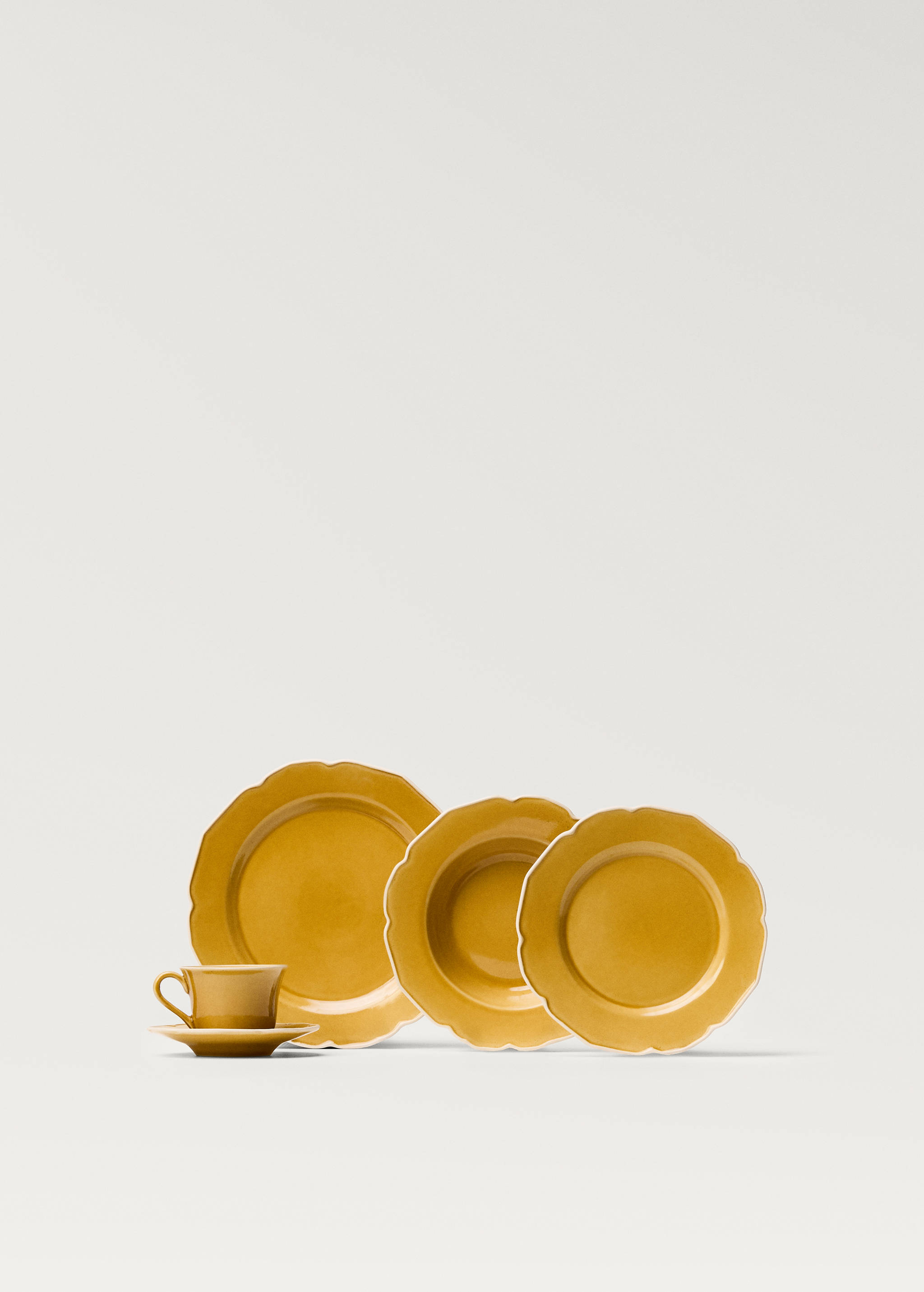 Teetasse aus Steingut mit wellenförmigem Rand - Detail des Artikels 1