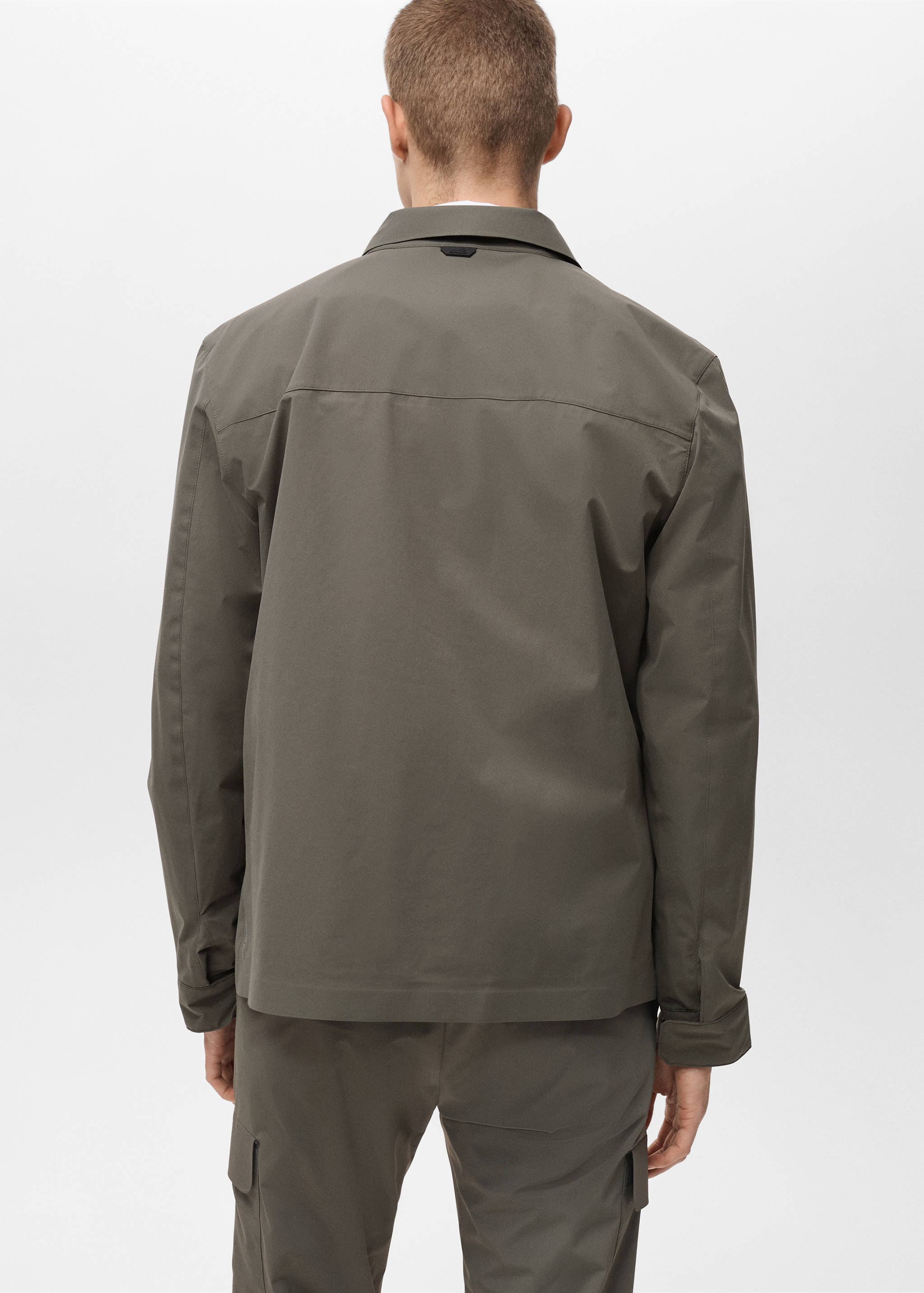 Water-repellent jacket with pockets - Reverse of the article