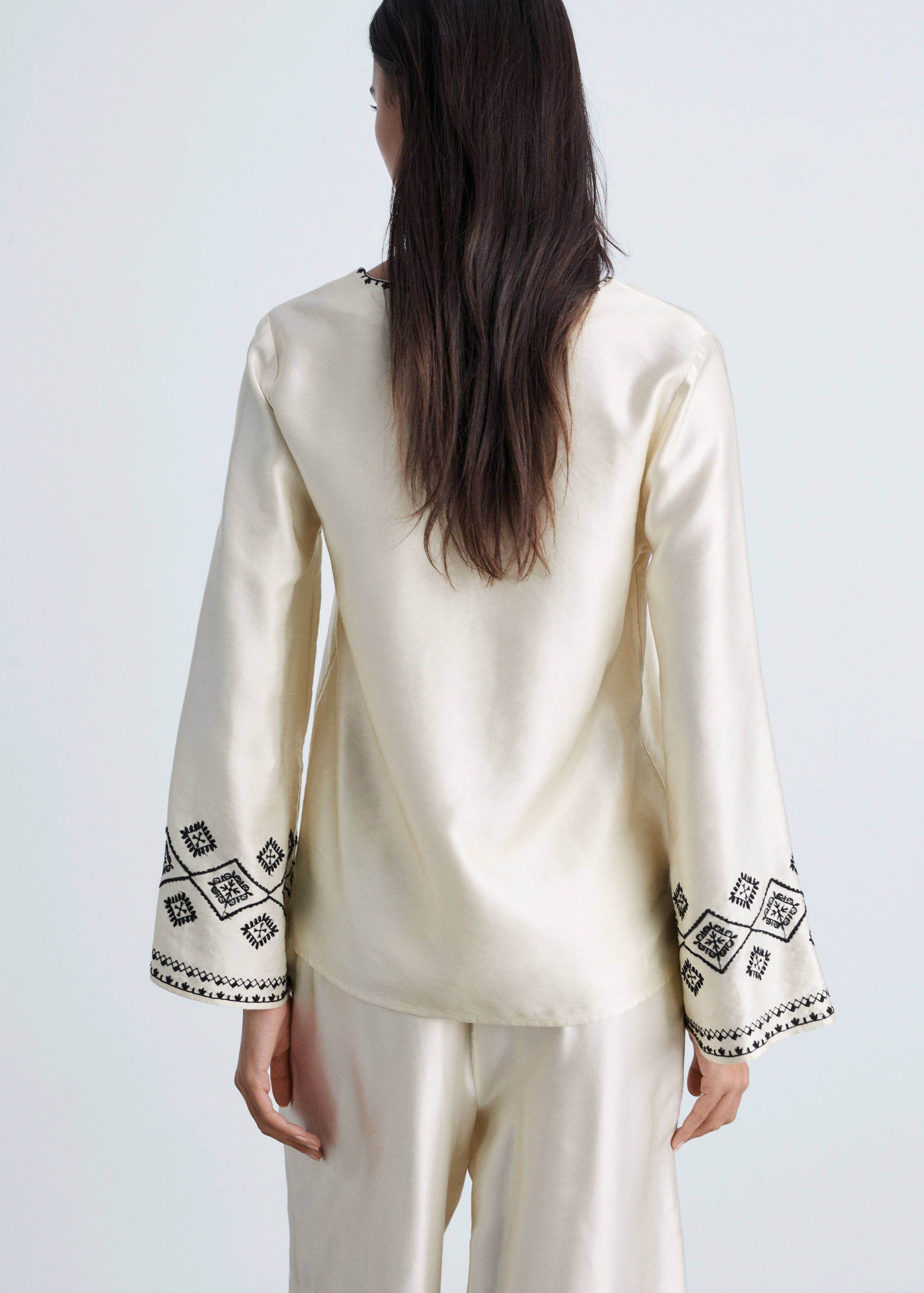 Embroidered satin blouse - Reverse of the article