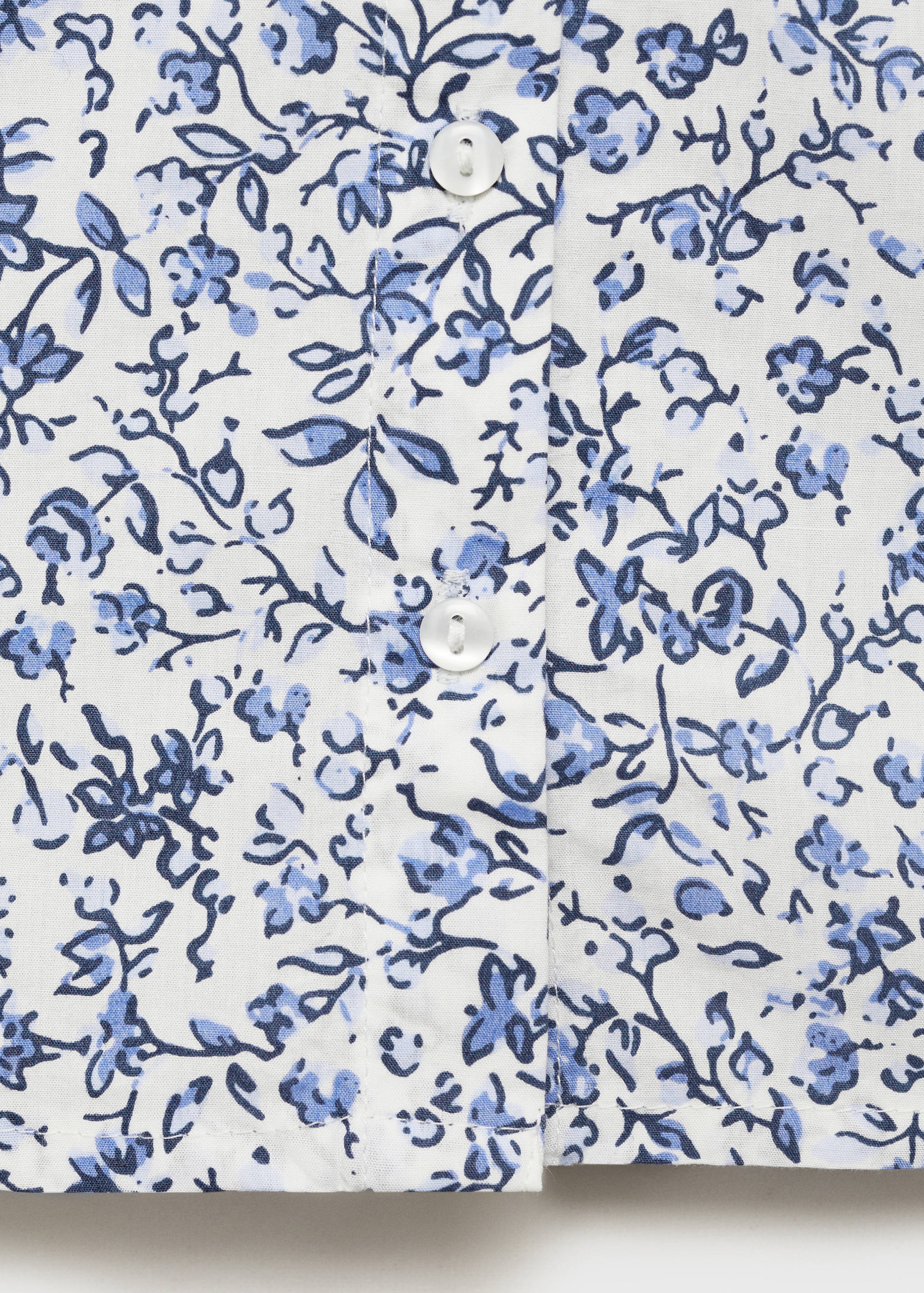 Gemusterte Bluse mit Babydollkragen - Detail des Artikels 0