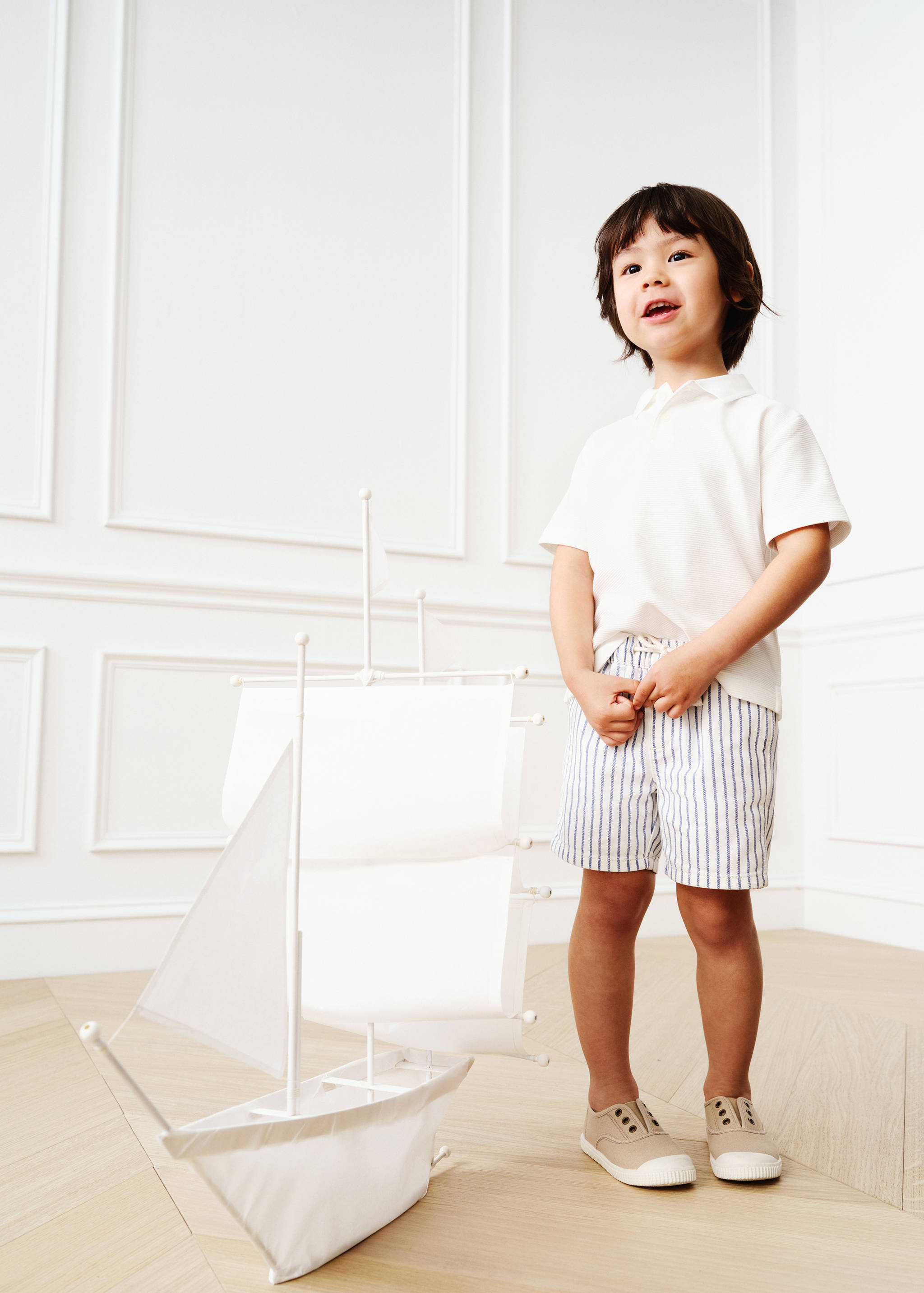 Kötött texturált pólóing - A termék adatai 5