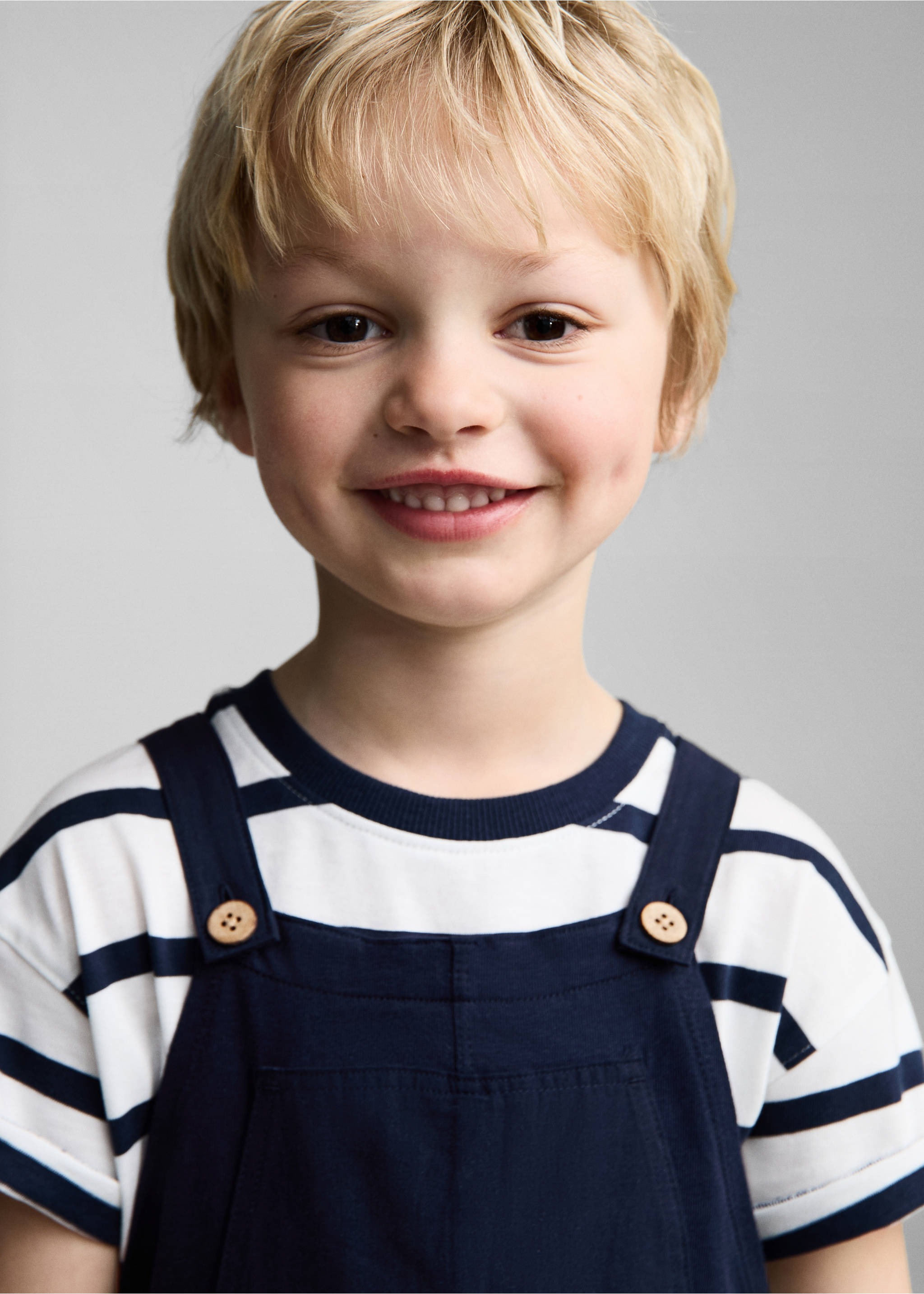 Cotton knit dungarees - Details of the article 1, Dark Navy. Ref: 87055957-00.