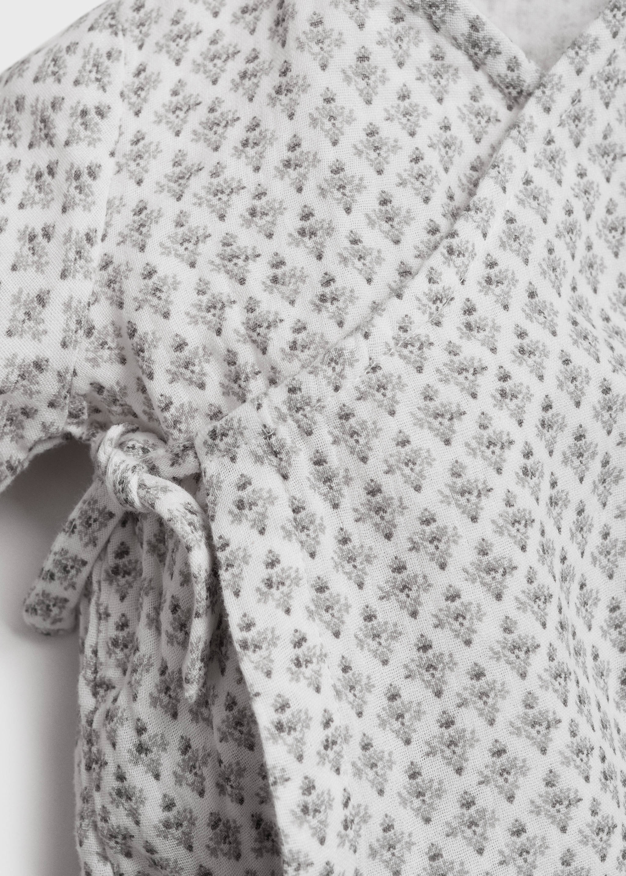 Printed crossover romper suit - Details of the article 8